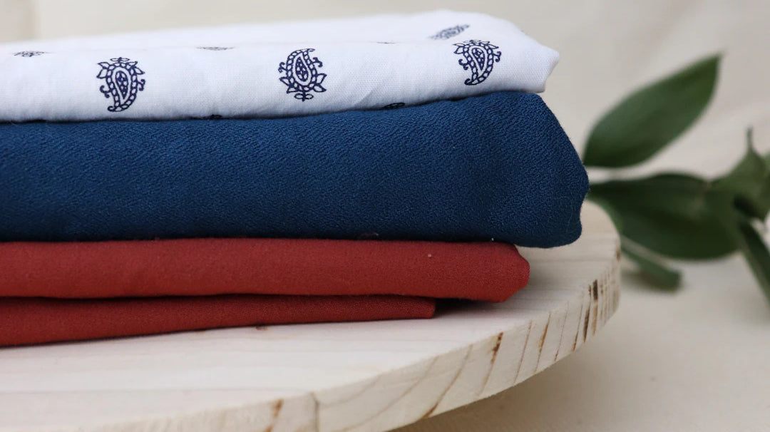 L'histoire des tissus emblématiques des maisons de couture