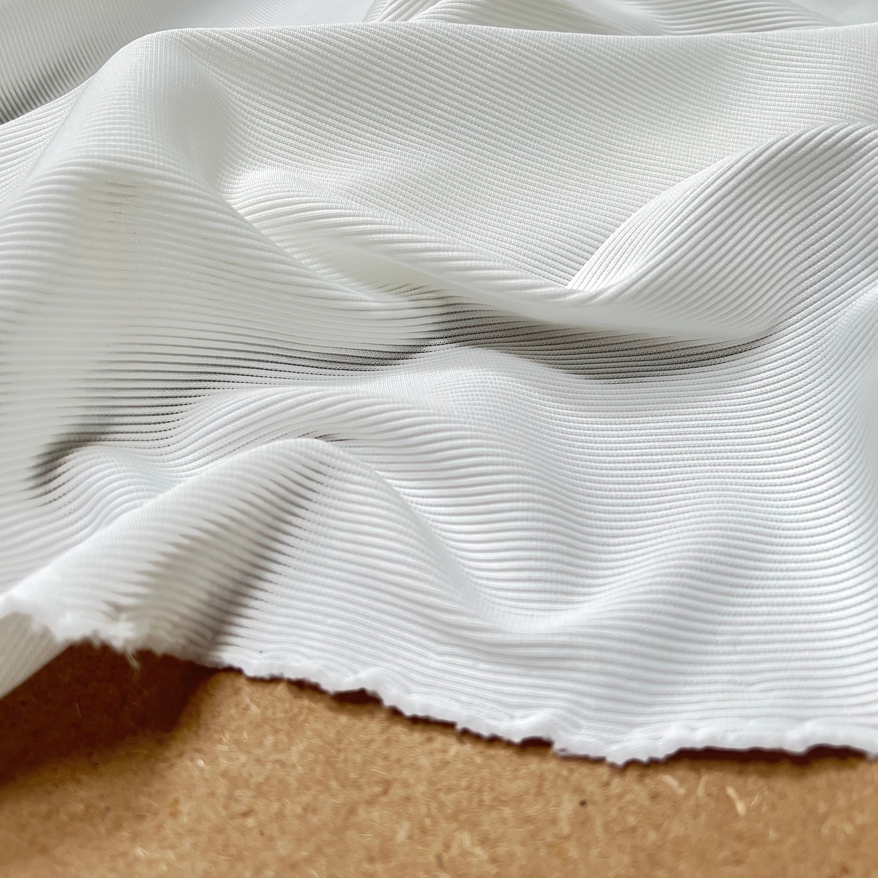 CÔTE 1*1 POLYAMIDE STRETCH BLANC OPTIQUE MLC INTERN