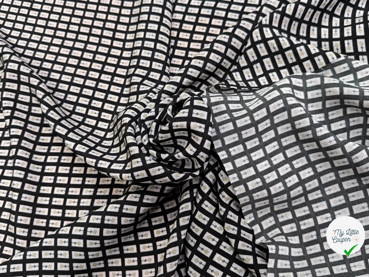 CRÊPE DE VISCOSE IMPRIMÉ SEMIS DE FLEURS FOND NOIR - My Little Coupon