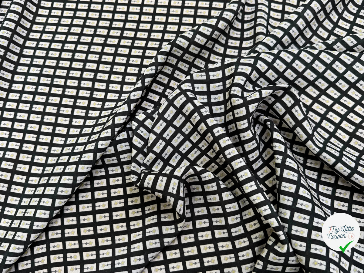 CRÊPE DE VISCOSE IMPRIMÉ SEMIS DE FLEURS FOND NOIR - My Little Coupon