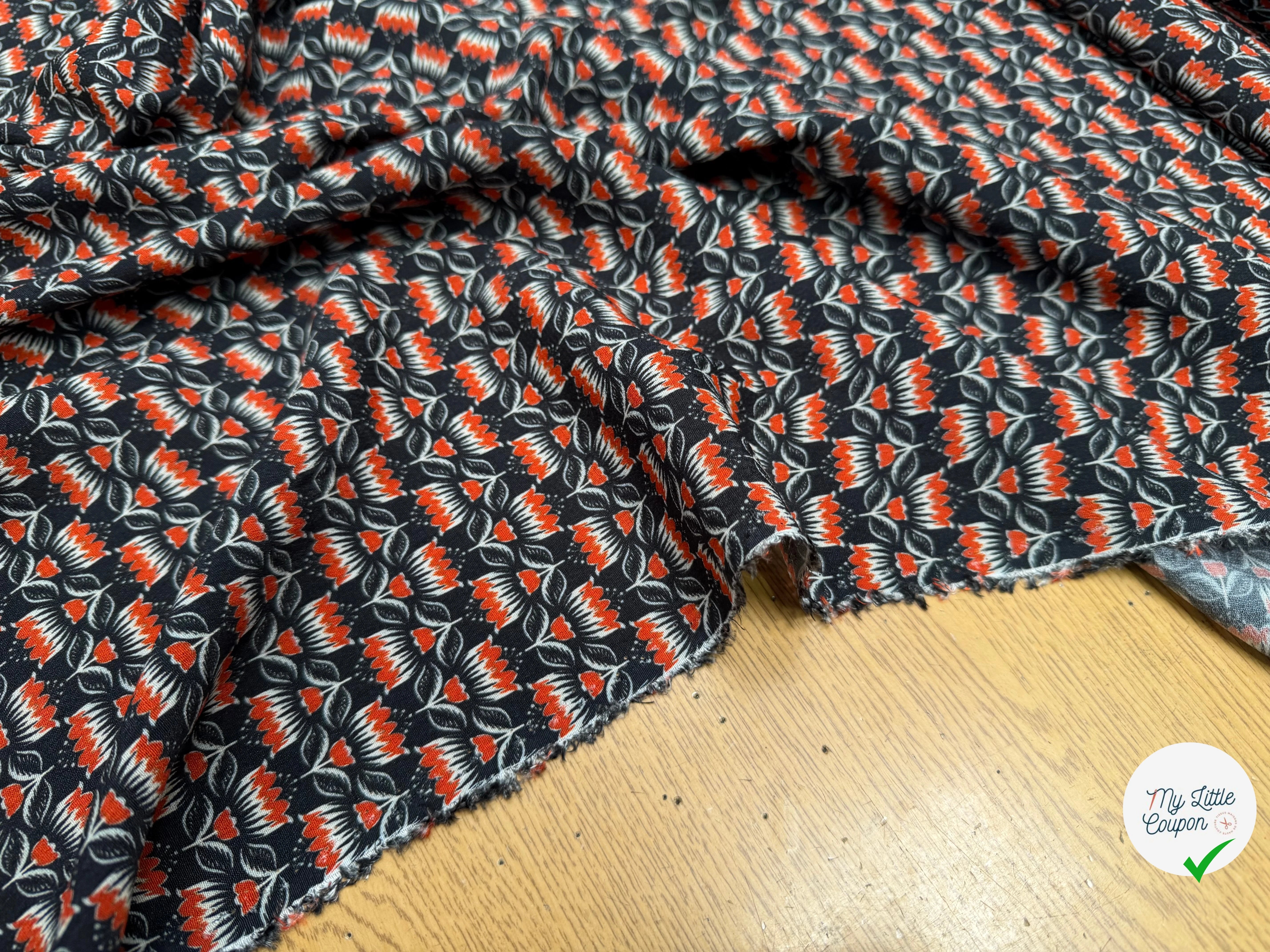 CREPE MAROCAIN VISCOSE QUALITÉ COMO NOIR FLORALIE ORANGE - My Little Coupon