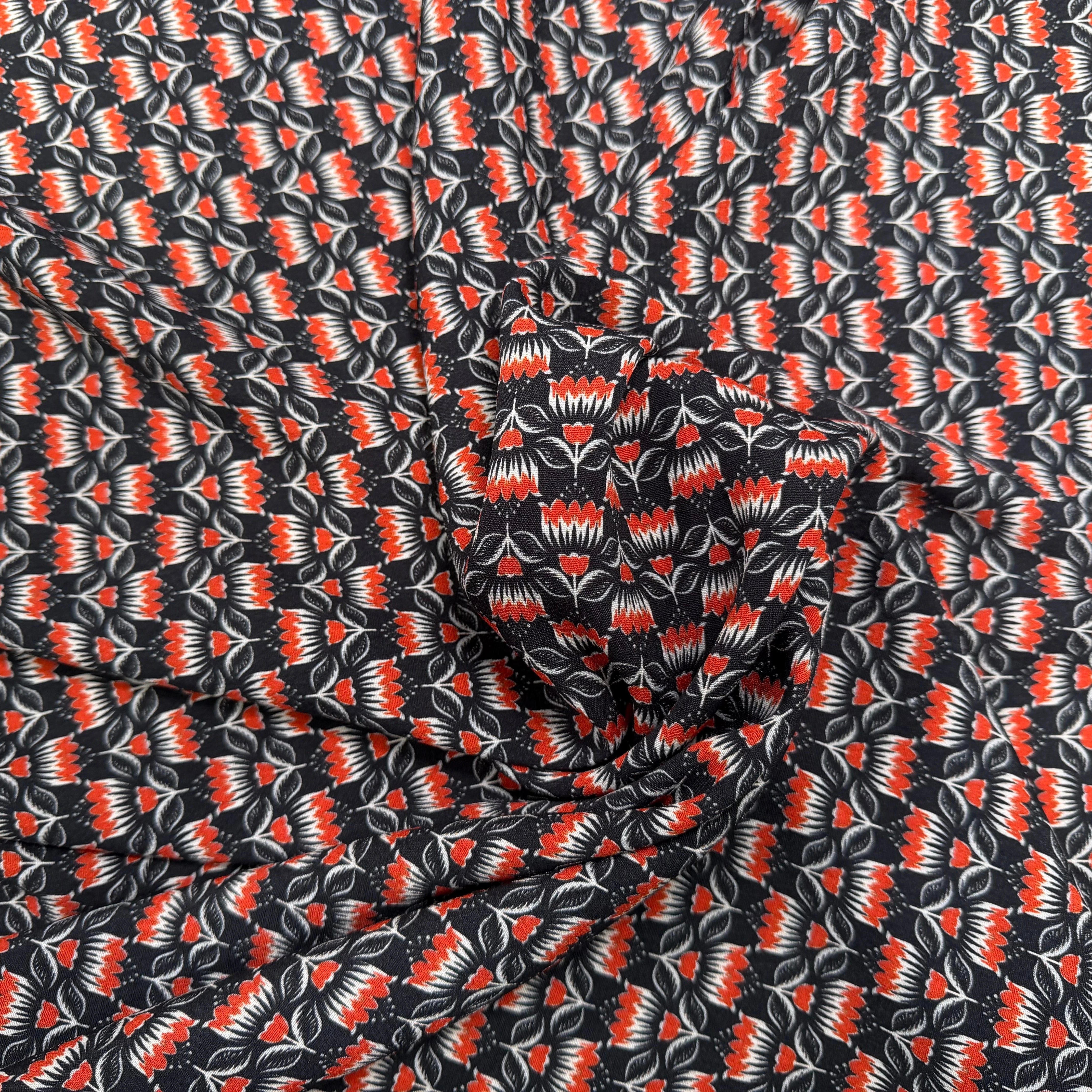 CREPE MAROCAIN VISCOSE QUALITÉ COMO NOIR FLORALIE ORANGE - My Little Coupon