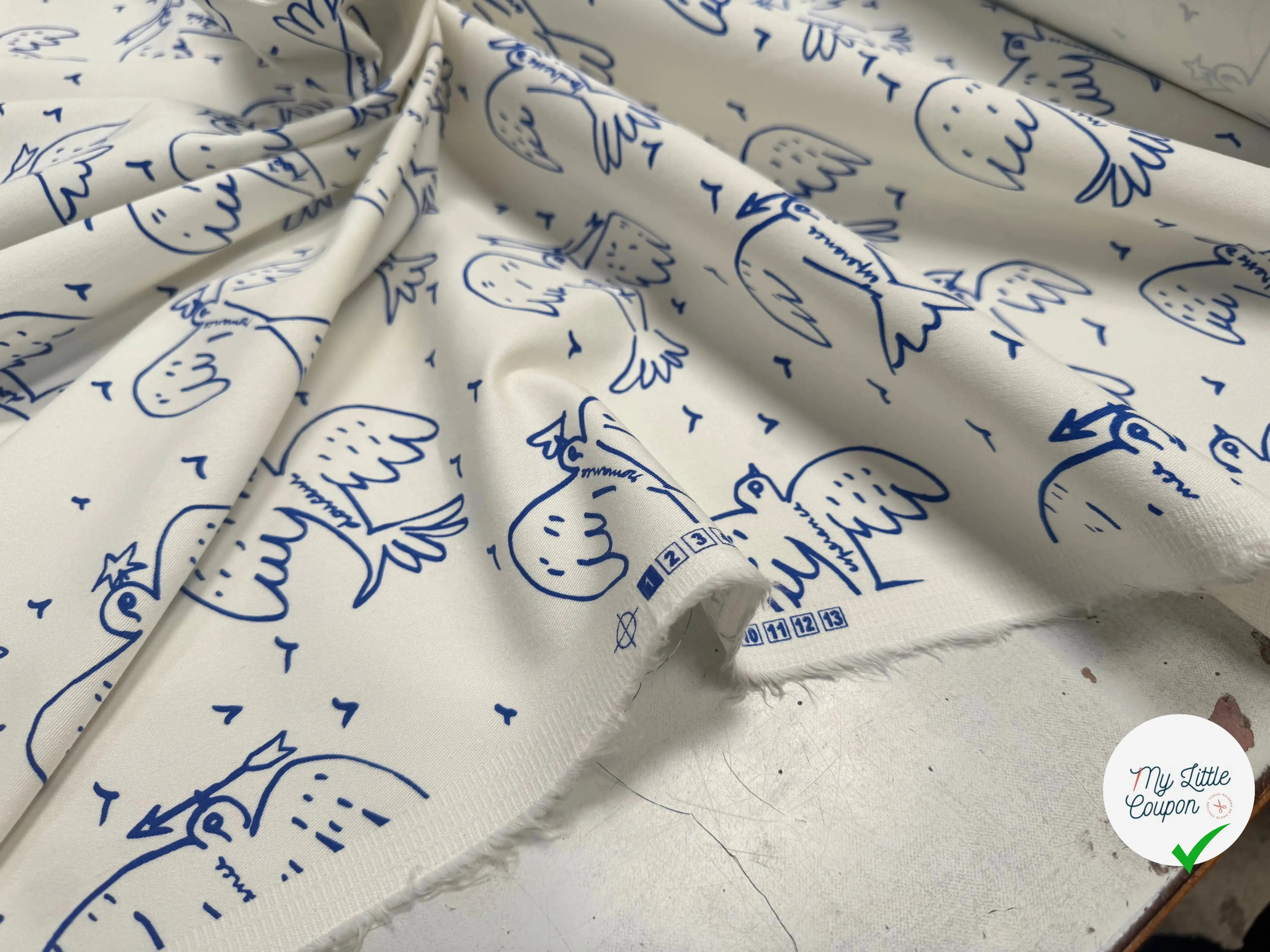 GABARDINE STRETCH DE COTON BLANC CASSÉ OISEAU BLEU - My Little Coupon