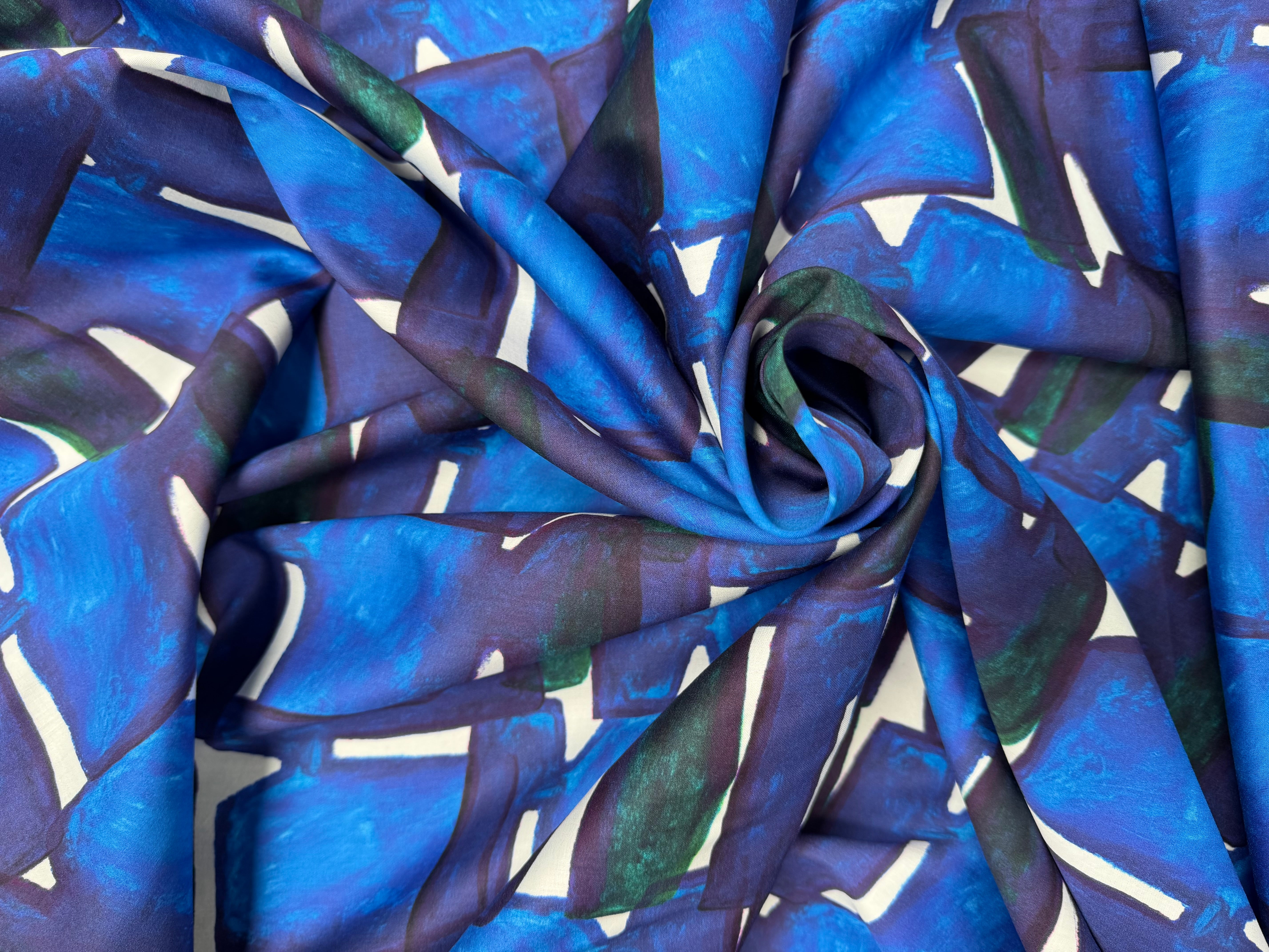 Tissu coton imprimé à motif graphique bleu