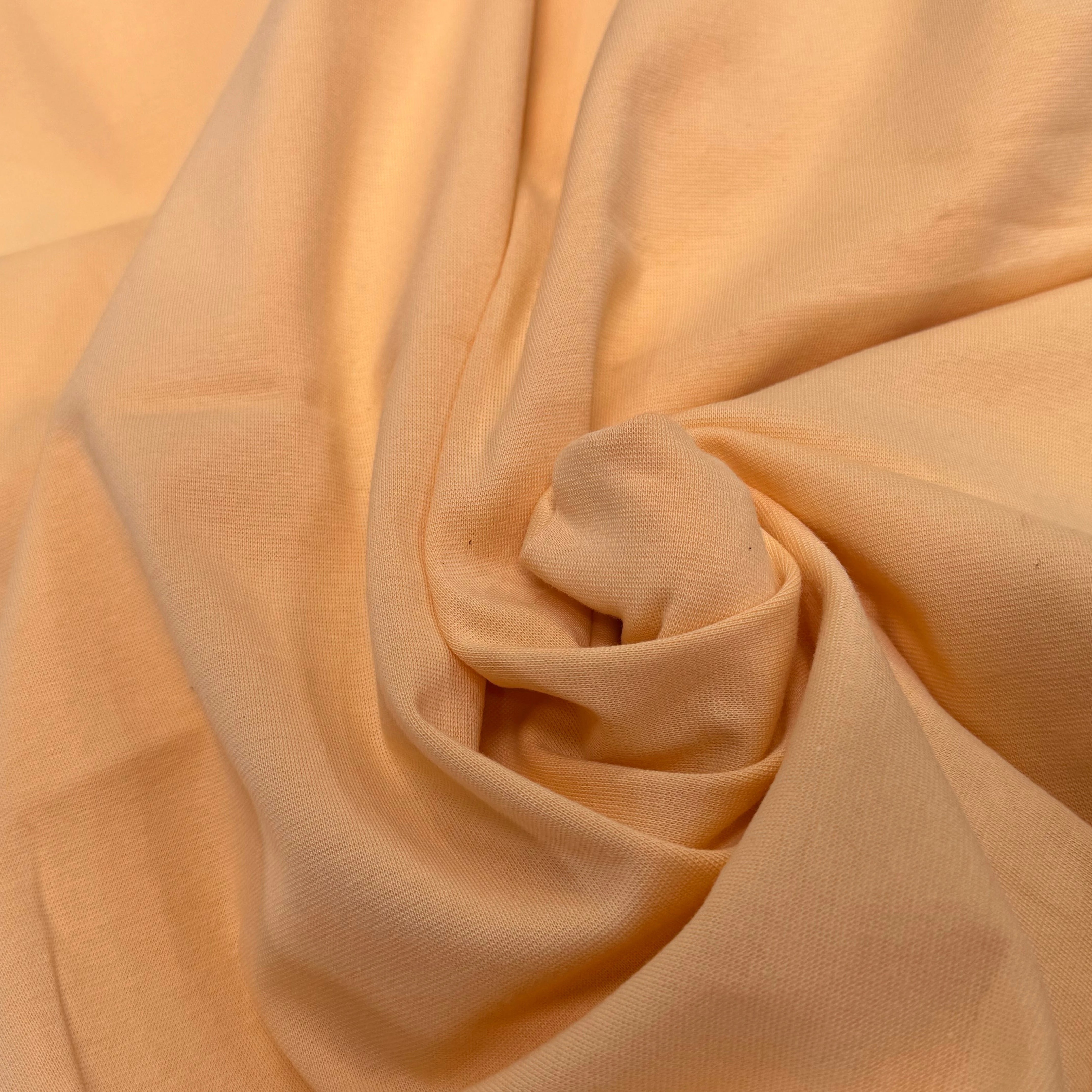 JERSEY COTON 2% ÉLASTHANNE TUBULAIRE 70CM CÔTE 1X1 BUFF ORANGE - My Little Coupon