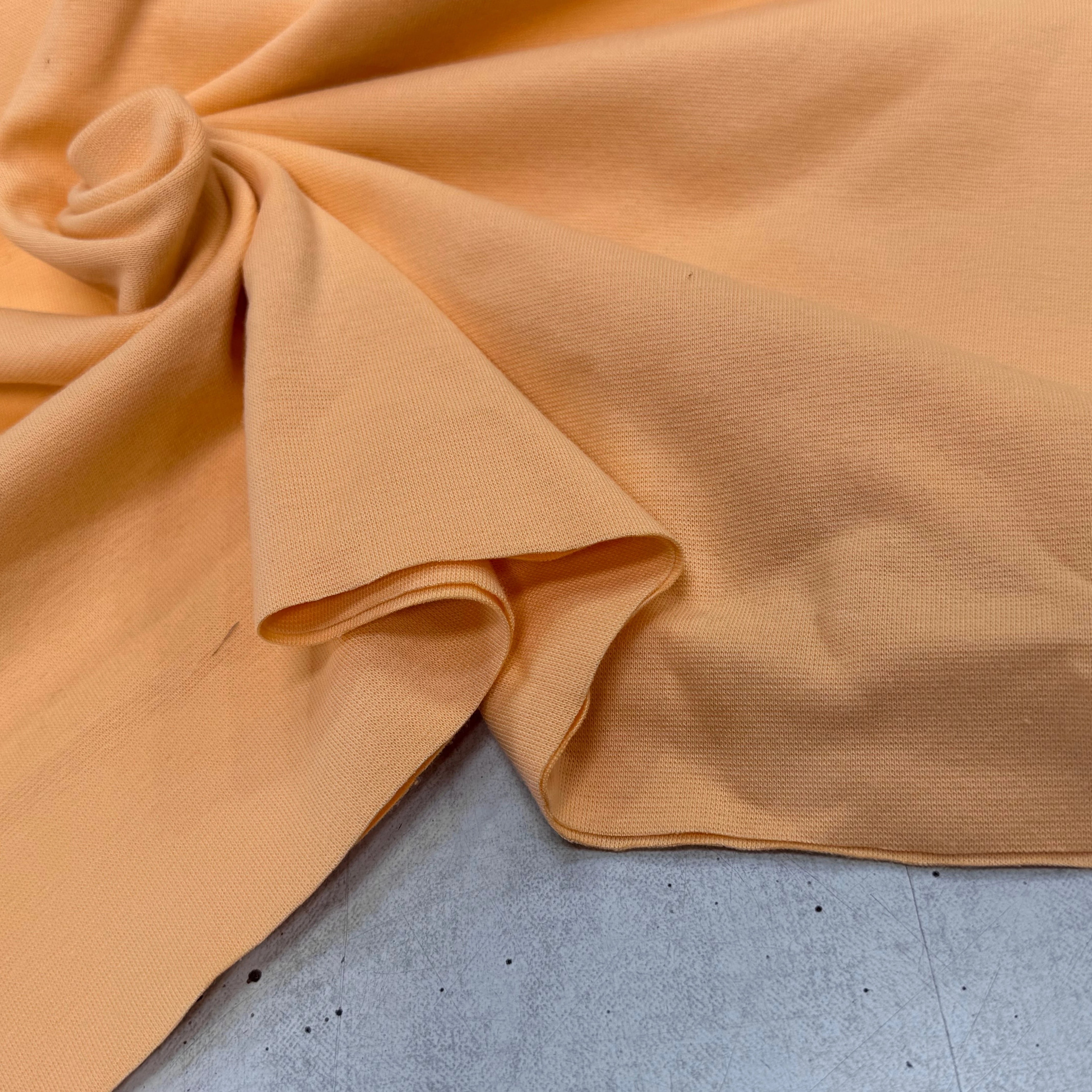 JERSEY COTON 2% ÉLASTHANNE TUBULAIRE 70CM CÔTE 1X1 BUFF ORANGE - My Little Coupon