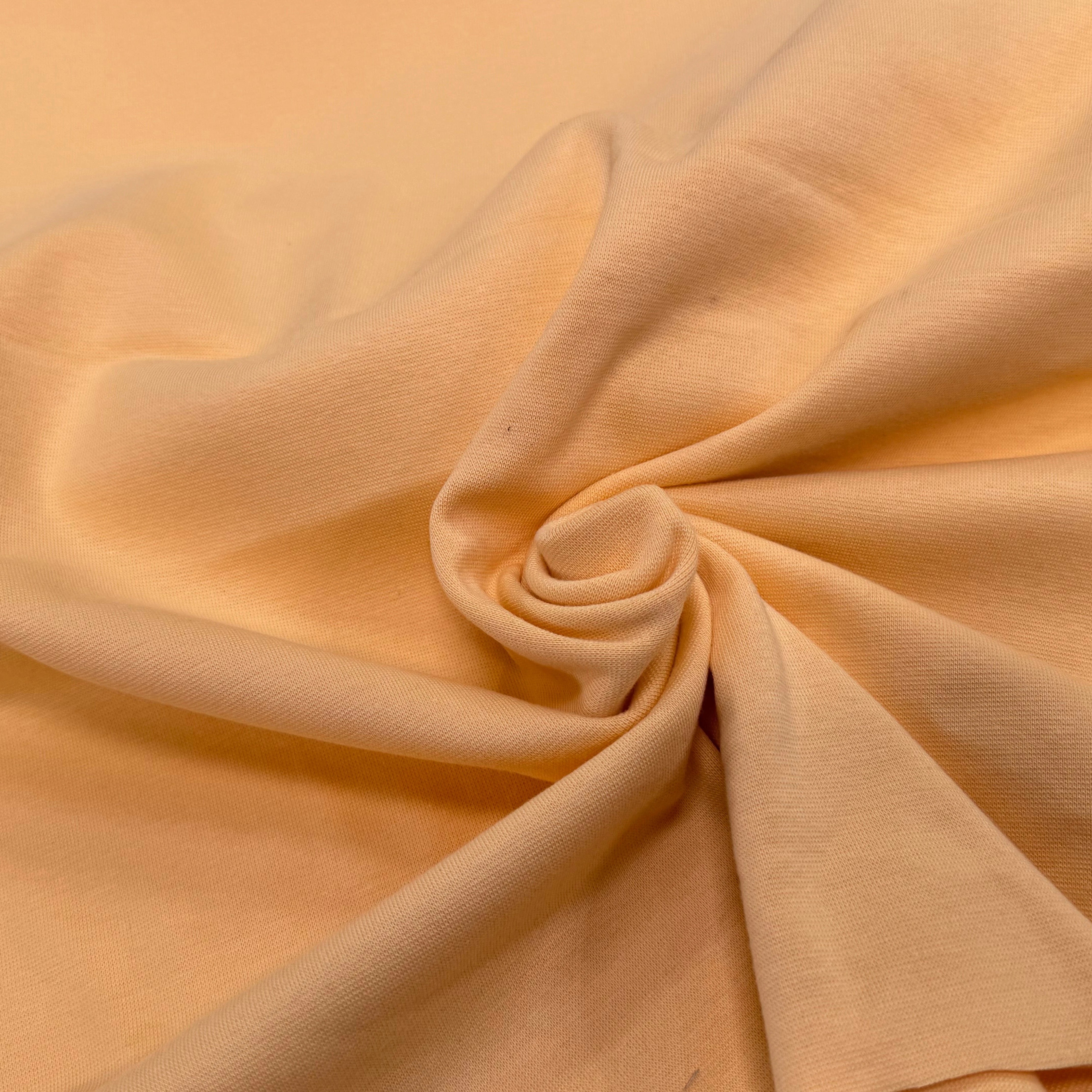 JERSEY COTON 2% ÉLASTHANNE TUBULAIRE 70CM CÔTE 1X1 BUFF ORANGE - My Little Coupon
