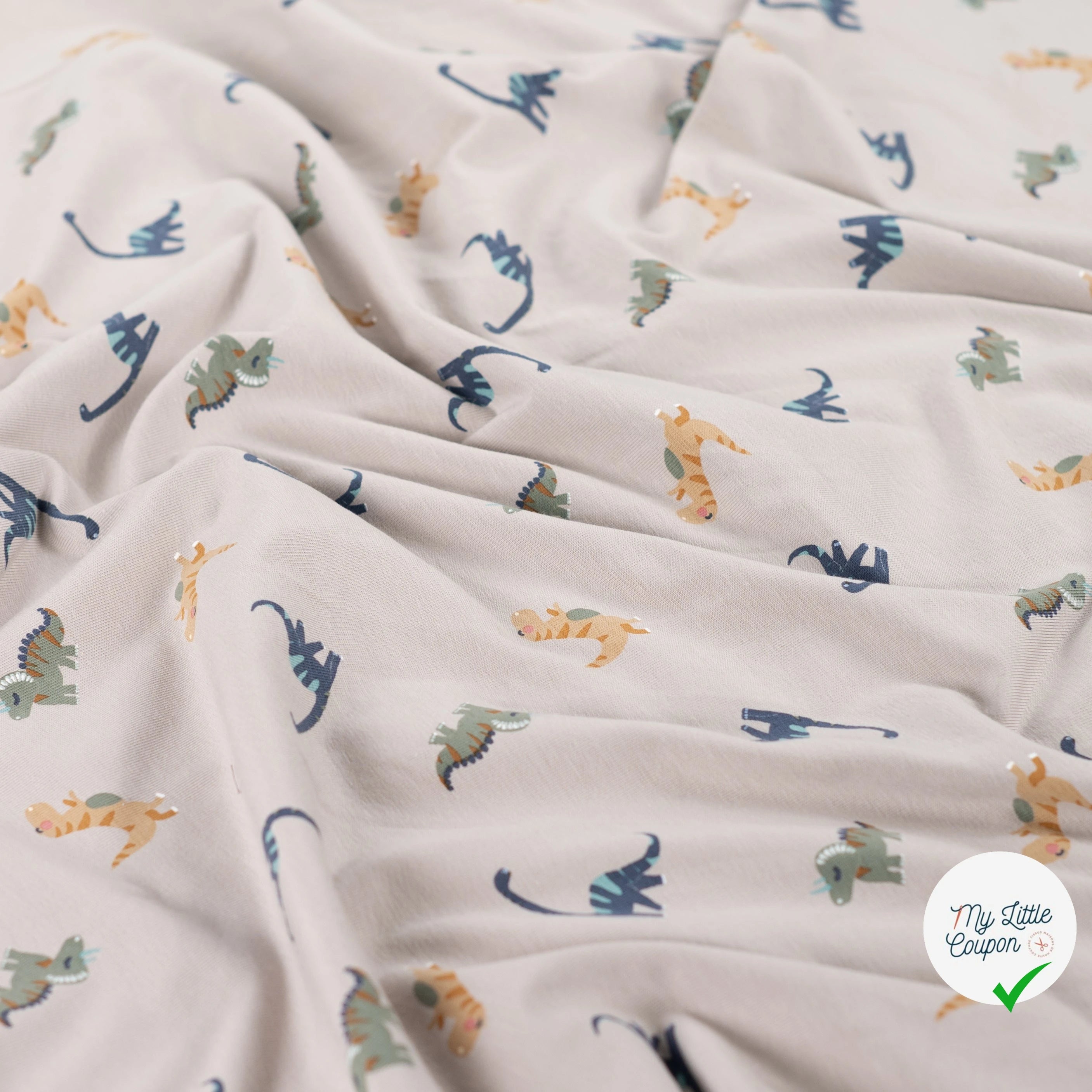 JERSEY DE COTON IMPRIMÉ DINOSAURES FOND SABLE - My Little Coupon