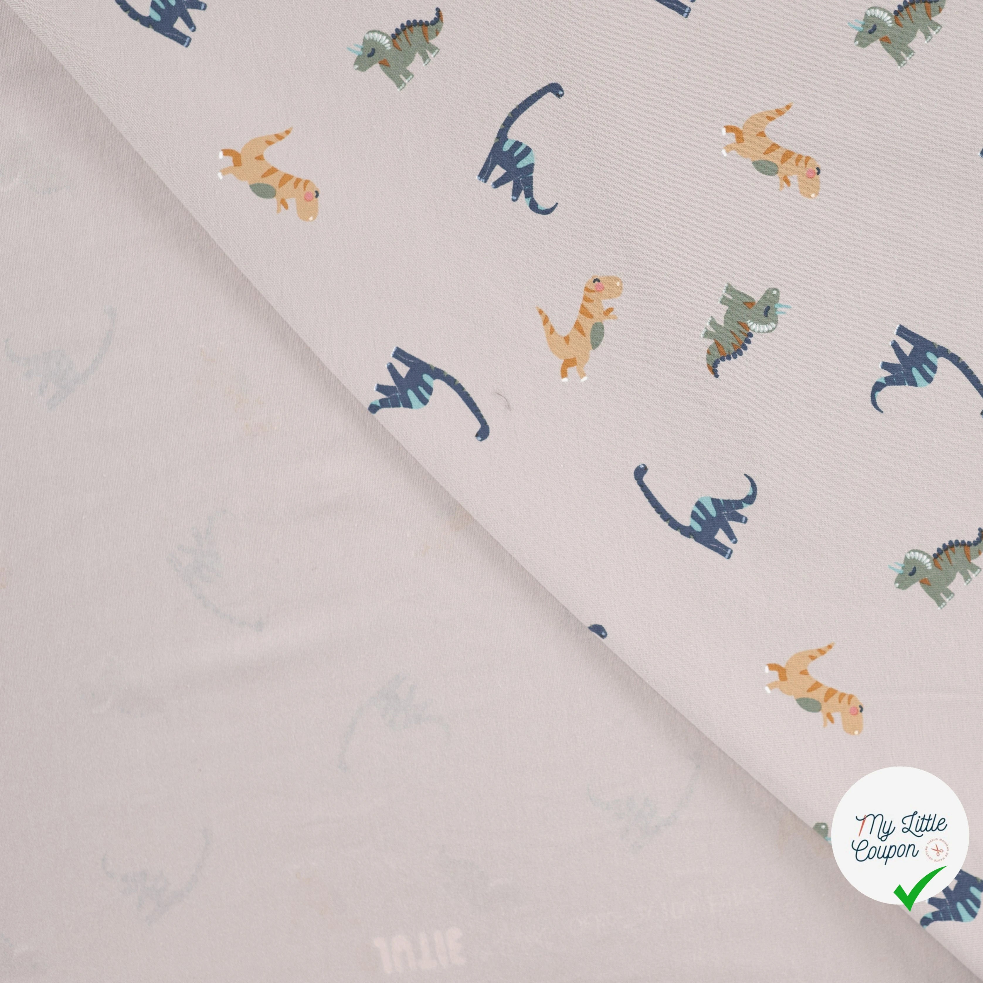 JERSEY DE COTON IMPRIMÉ DINOSAURES FOND SABLE - My Little Coupon