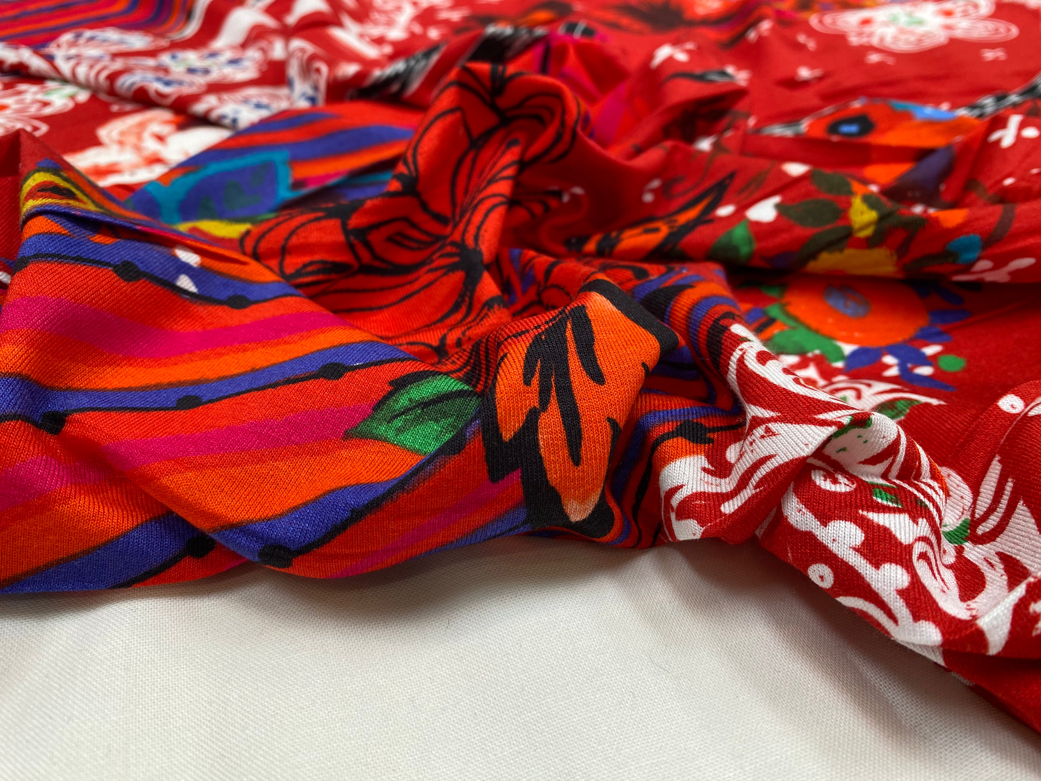 JERSEY VISCOSE EXPLOSION DE FLEURS FOND ROUGE - My Little Coupon
