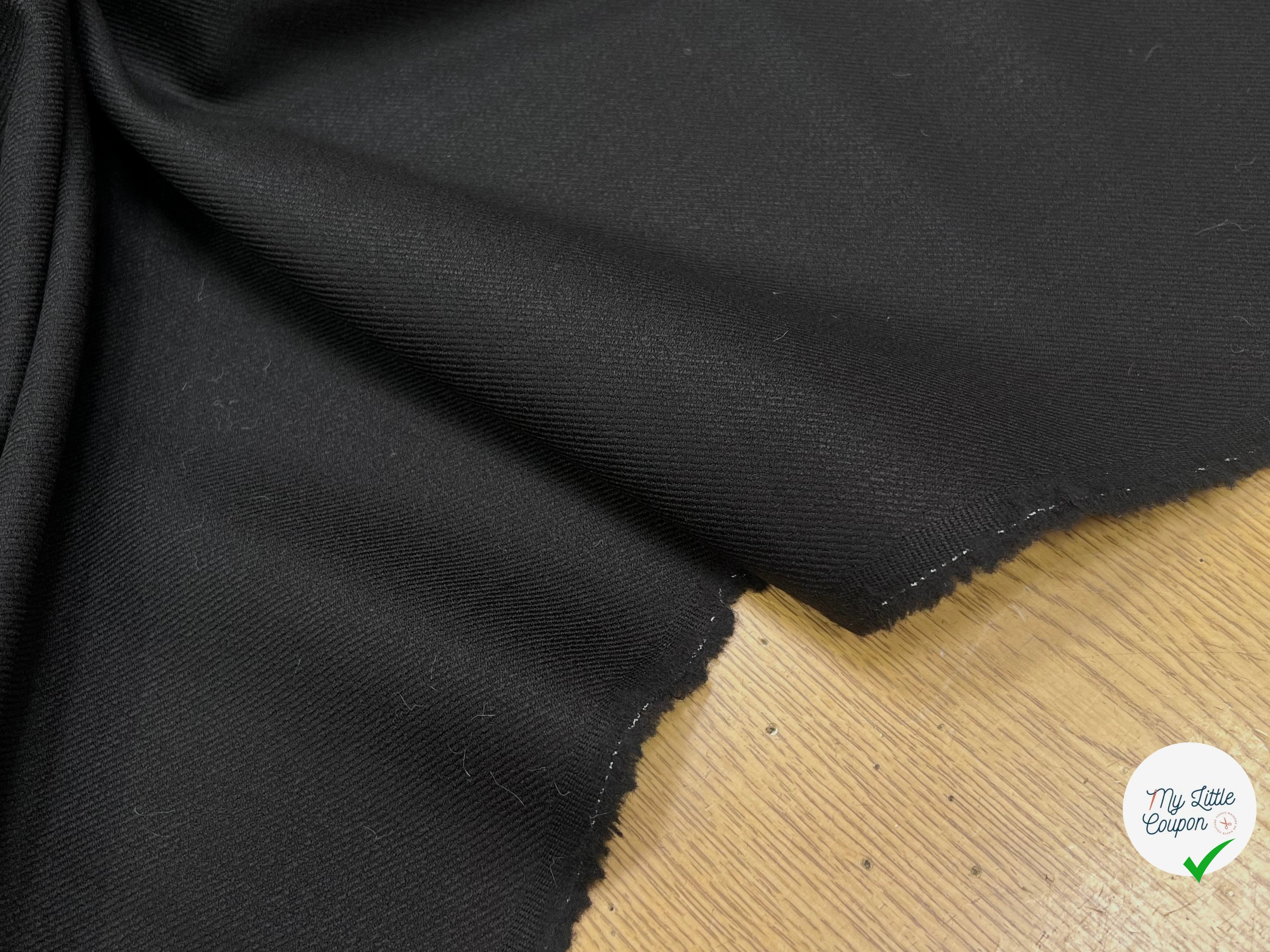 LAINAGE SERGÉ STRETCH LOURD ET FLUIDE SUBLIME NOIR 98% LAINE - My Little Coupon