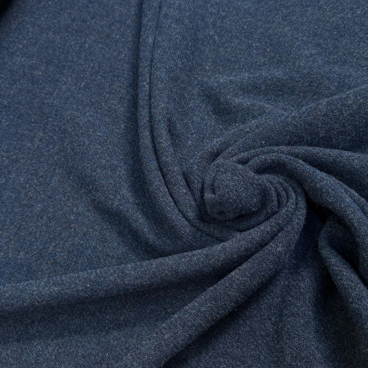 Tissu laine tricotée feutrée bleu moucheté - tombé du tissu