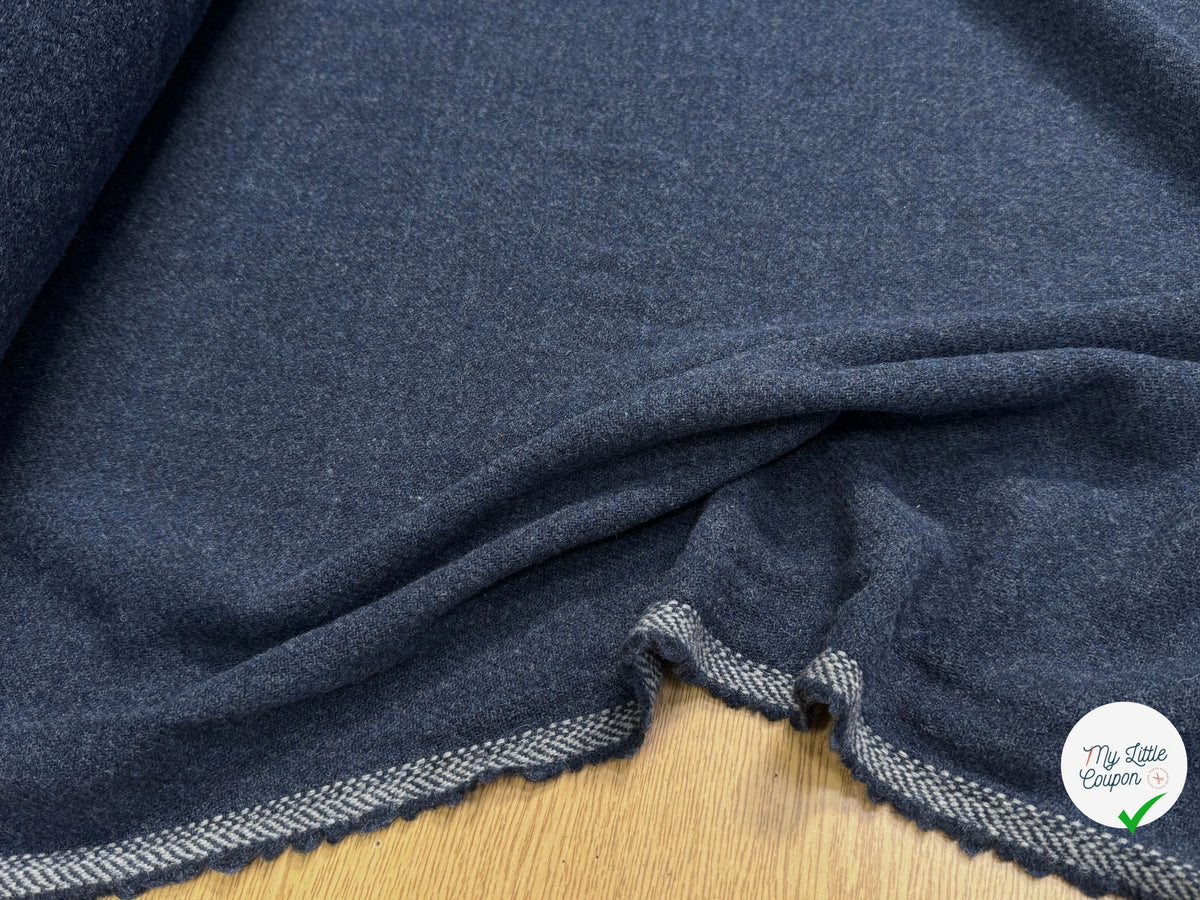 Tissu laine tricotée feutrée bleu moucheté - texture en gros plan