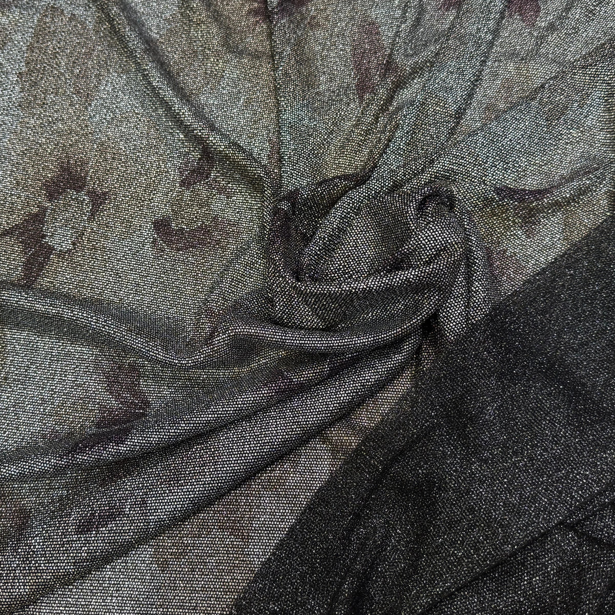 Tissu maille de fête argentée florale noir - texture en gros plan