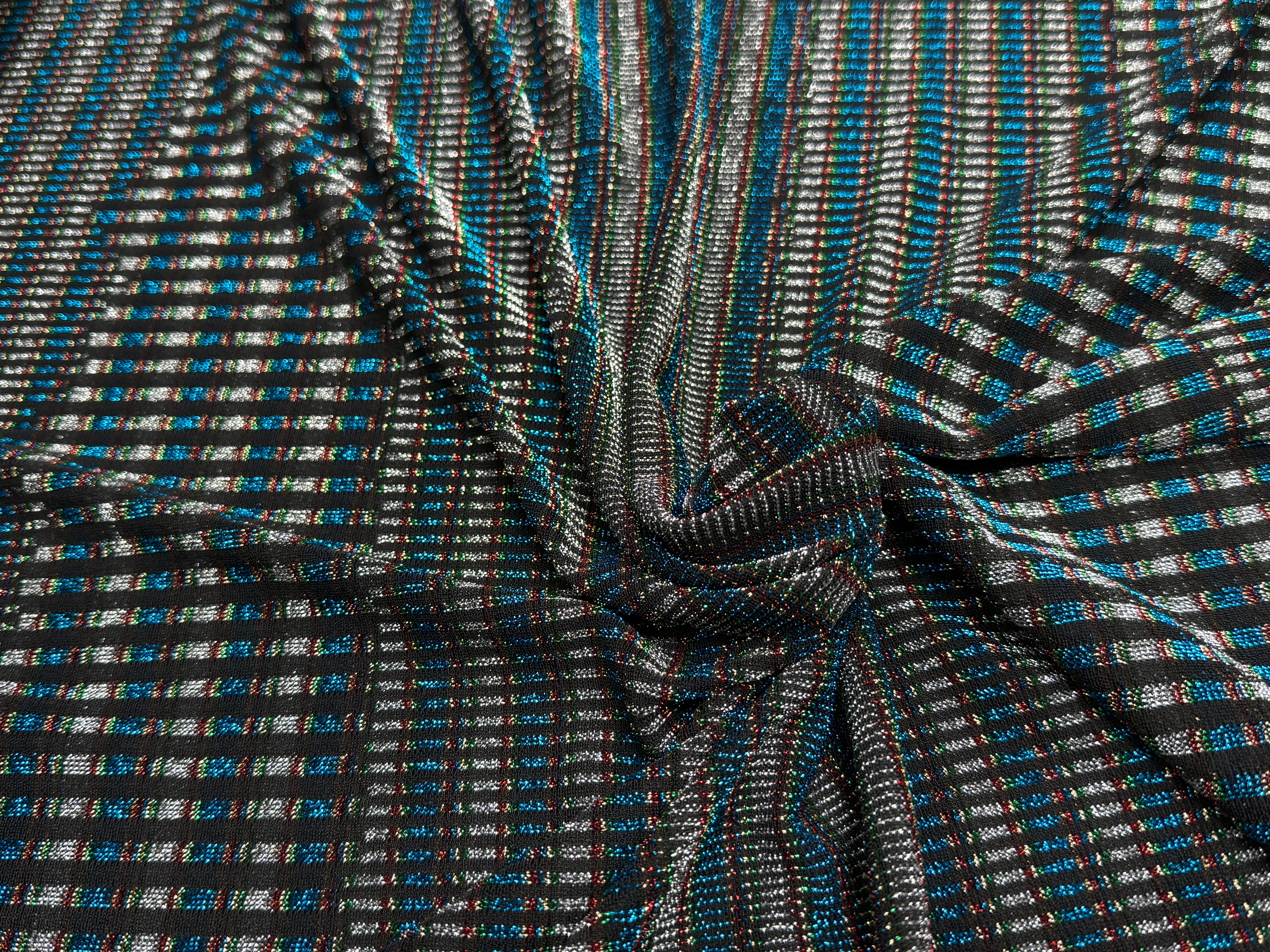 MAILLE FÊTE ULTRA STRETCH BRILLANT POLY INTERLOCK TURQUOISE/RED - My Little Coupon