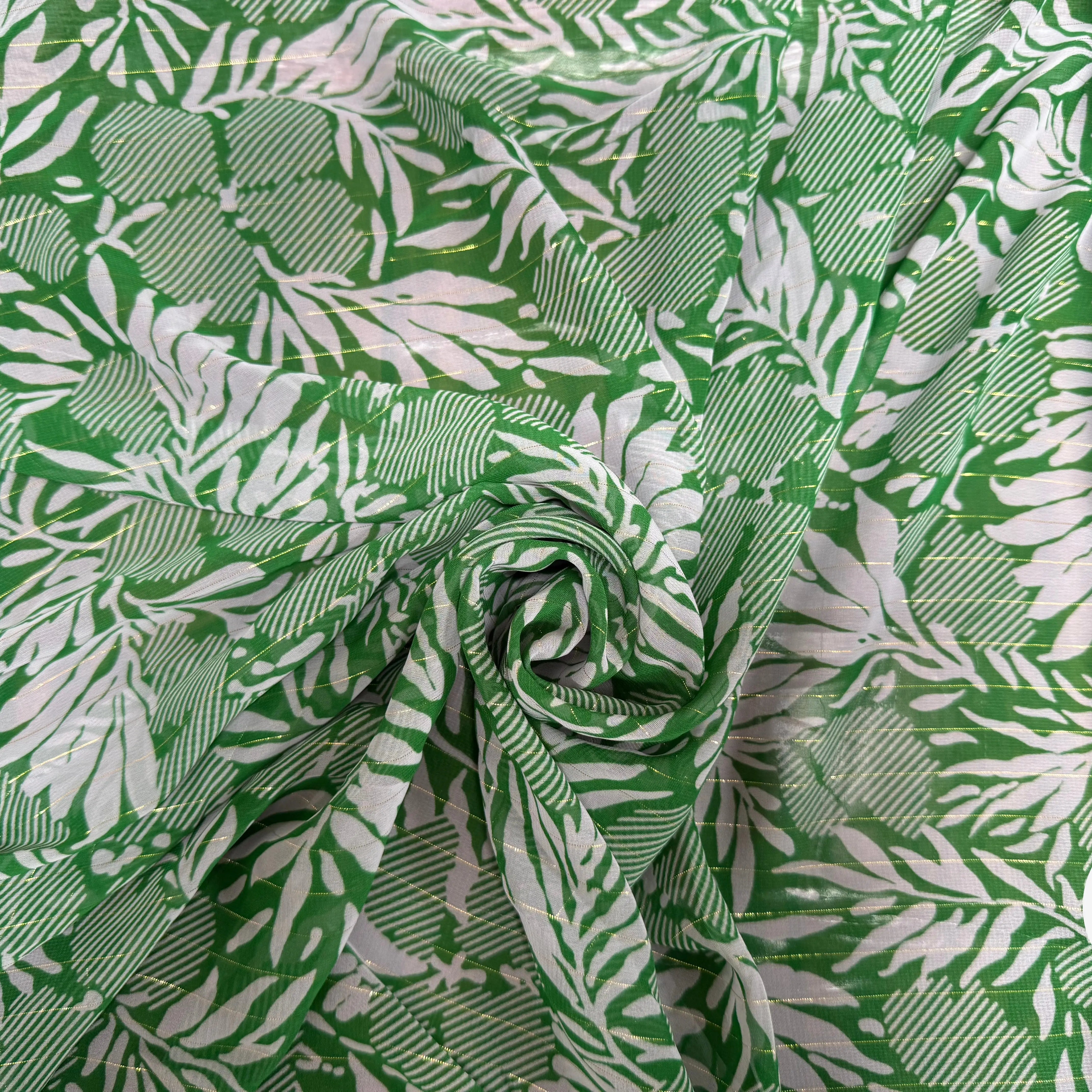 MOUSSELINE MOTIF FEUILLAGES VERT 100% POLYESTER - My Little Coupon