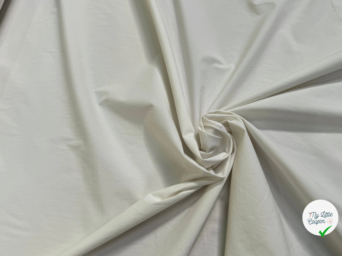 Tissu popeline de coton stretch craquante écru