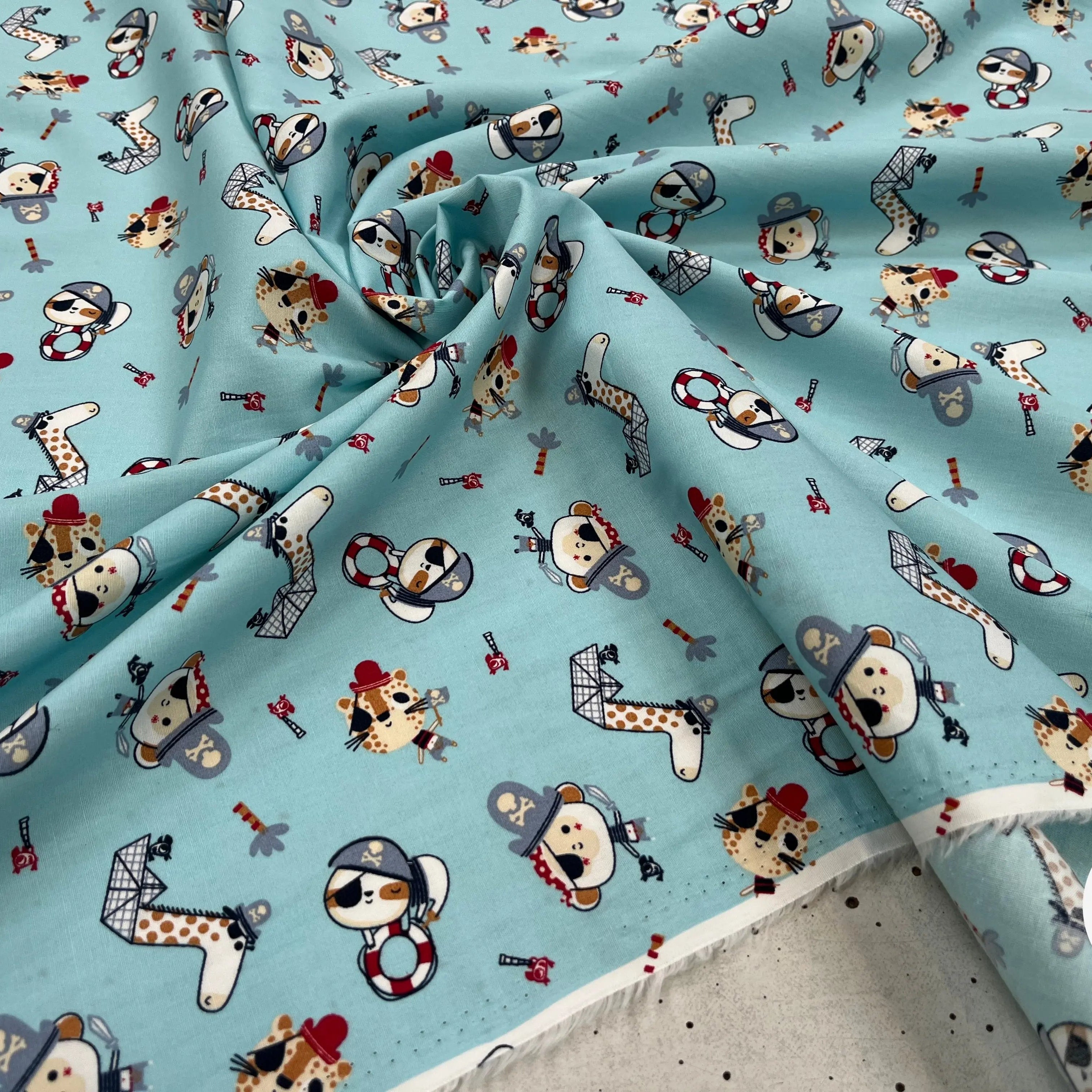 POPELINE DE COTON IMPRIMÉE LITTLE ONES PIRATES KID BLEU CIEL - My Little Coupon