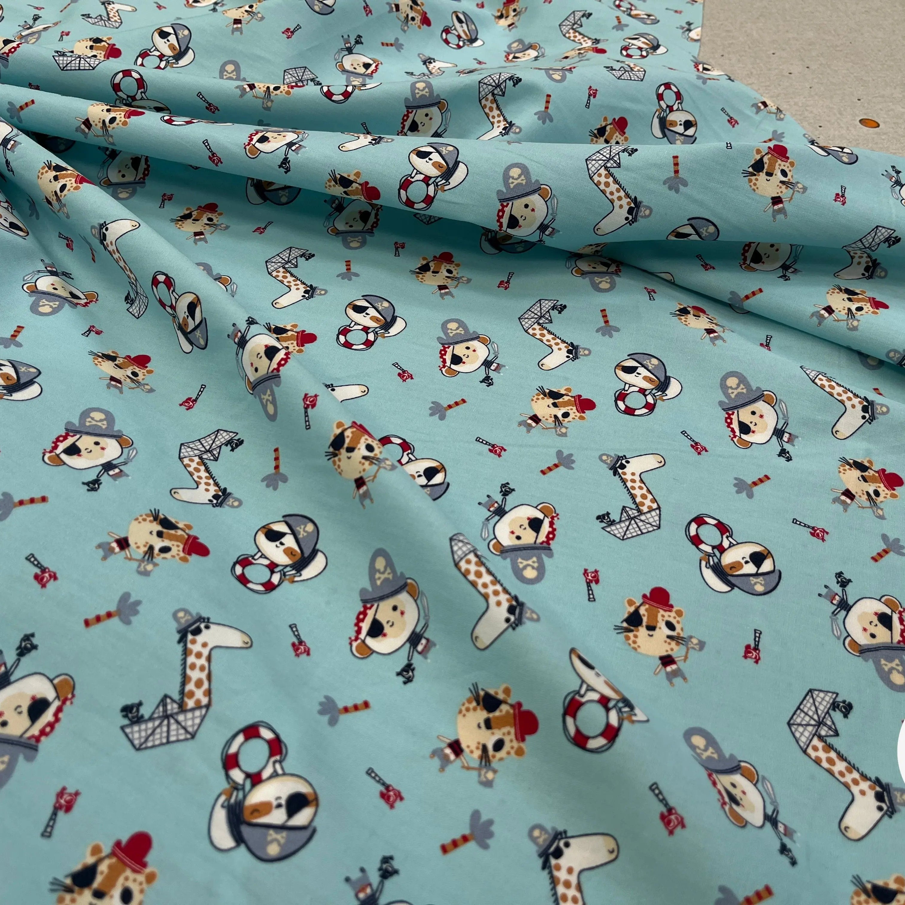 POPELINE DE COTON IMPRIMÉE LITTLE ONES PIRATES KID BLEU CIEL - My Little Coupon