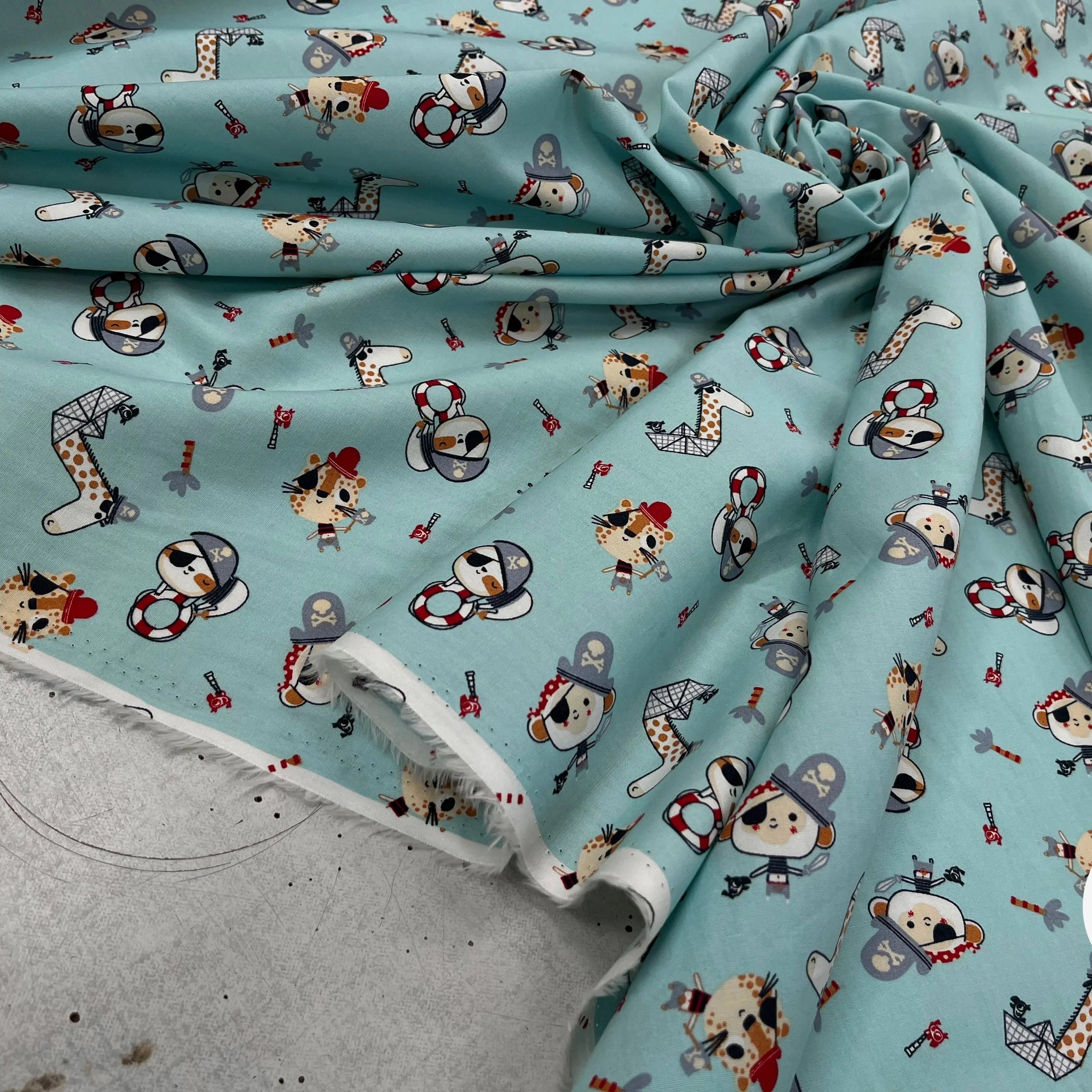 POPELINE DE COTON IMPRIMÉE LITTLE ONES PIRATES KID BLEU CIEL - My Little Coupon