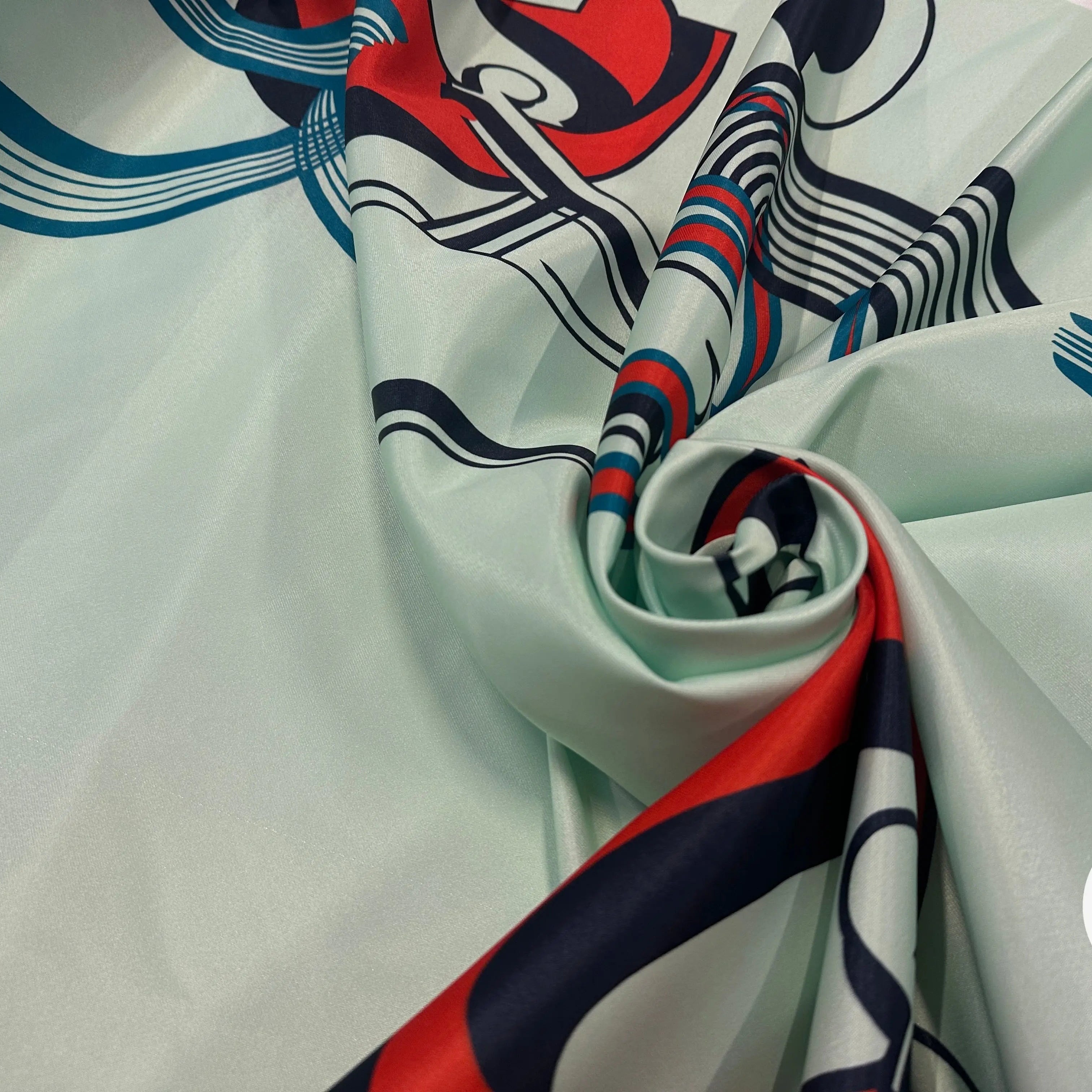 SATIN SERGÉ FOND VERT MOTIFS GEOMETRIE IRREGULIERES - My Little Coupon