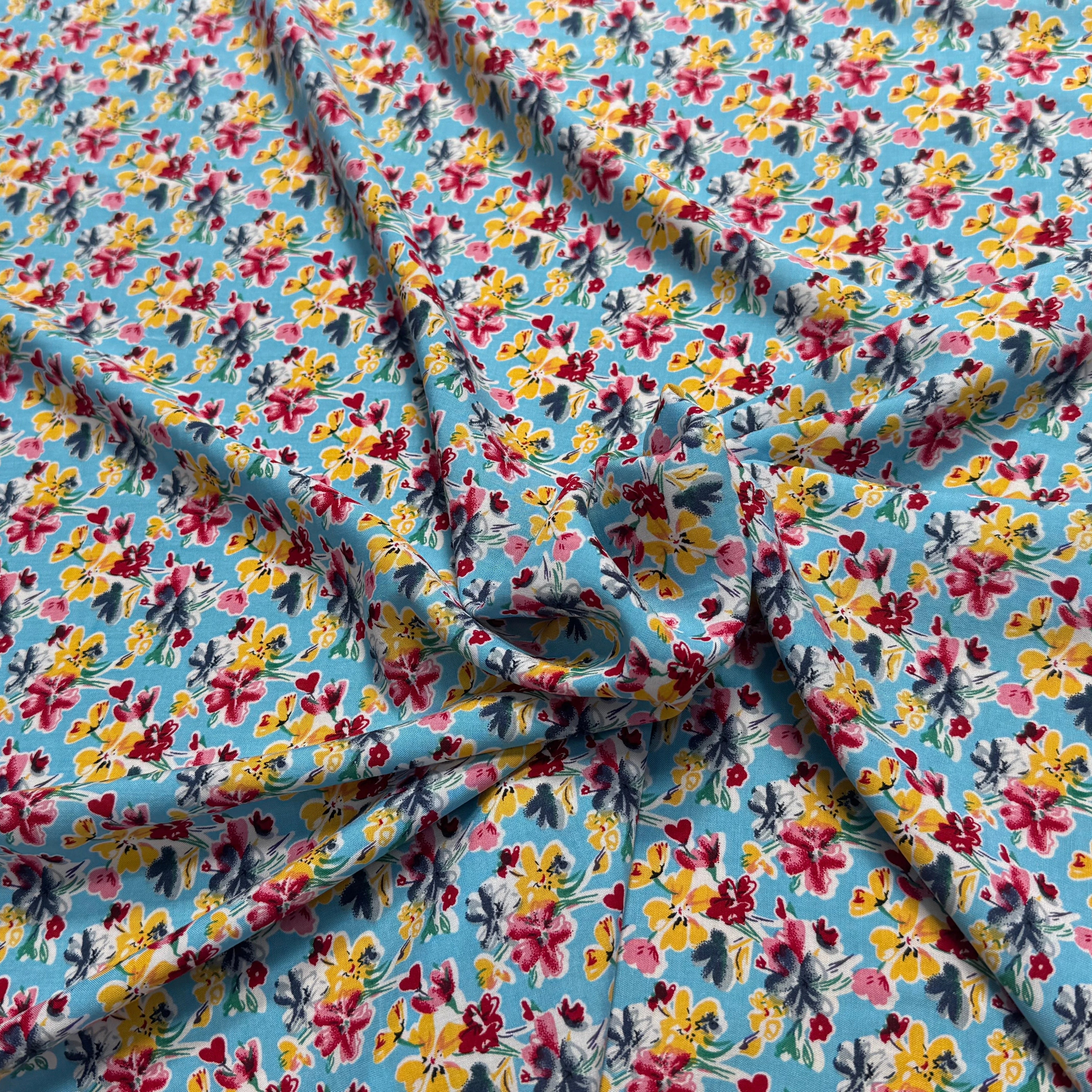 TISSU 100% VISCOSE FOND BLEU CIEL IMPRIMÉ BOUQUETS - My Little Coupon