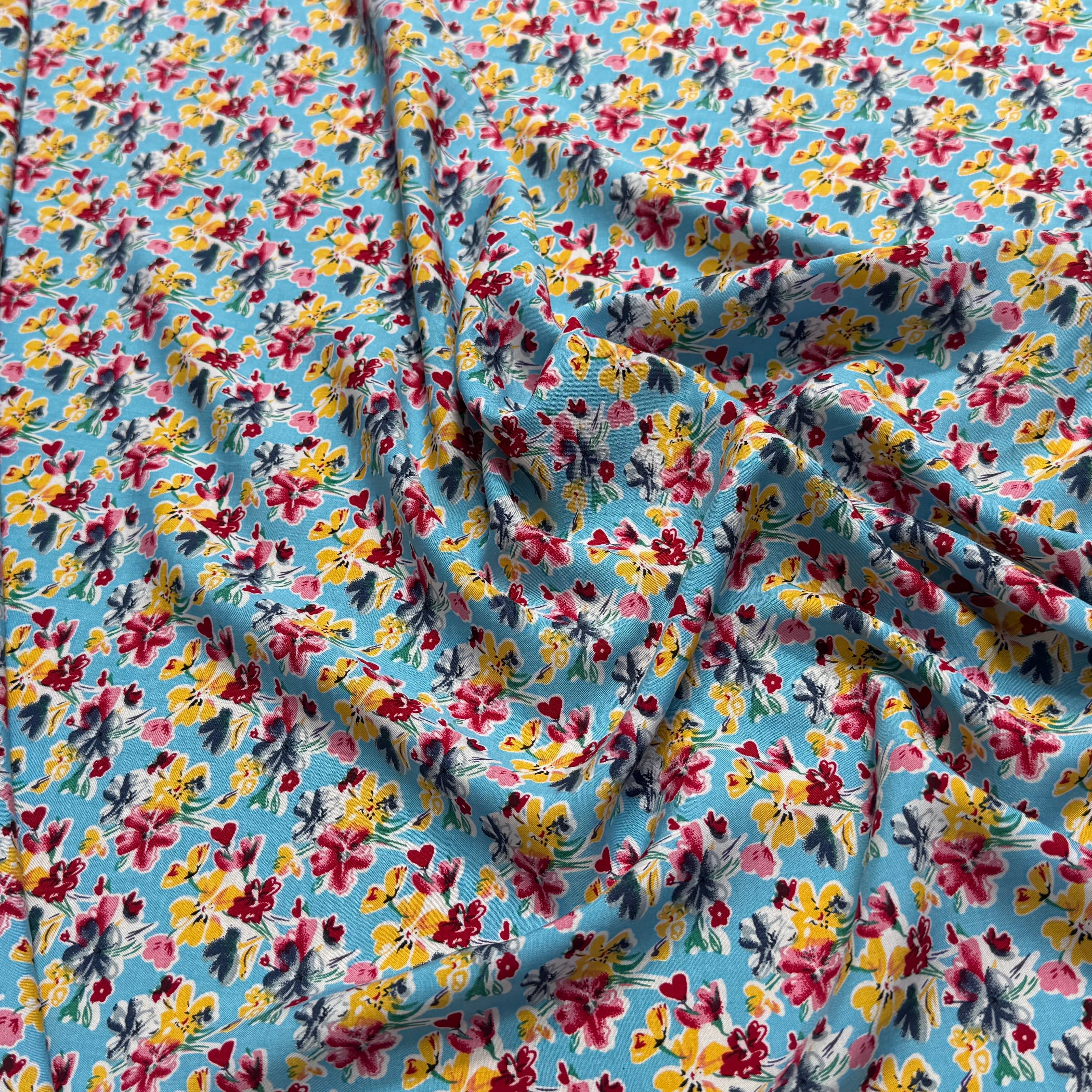 TISSU 100% VISCOSE FOND BLEU CIEL IMPRIMÉ BOUQUETS - My Little Coupon