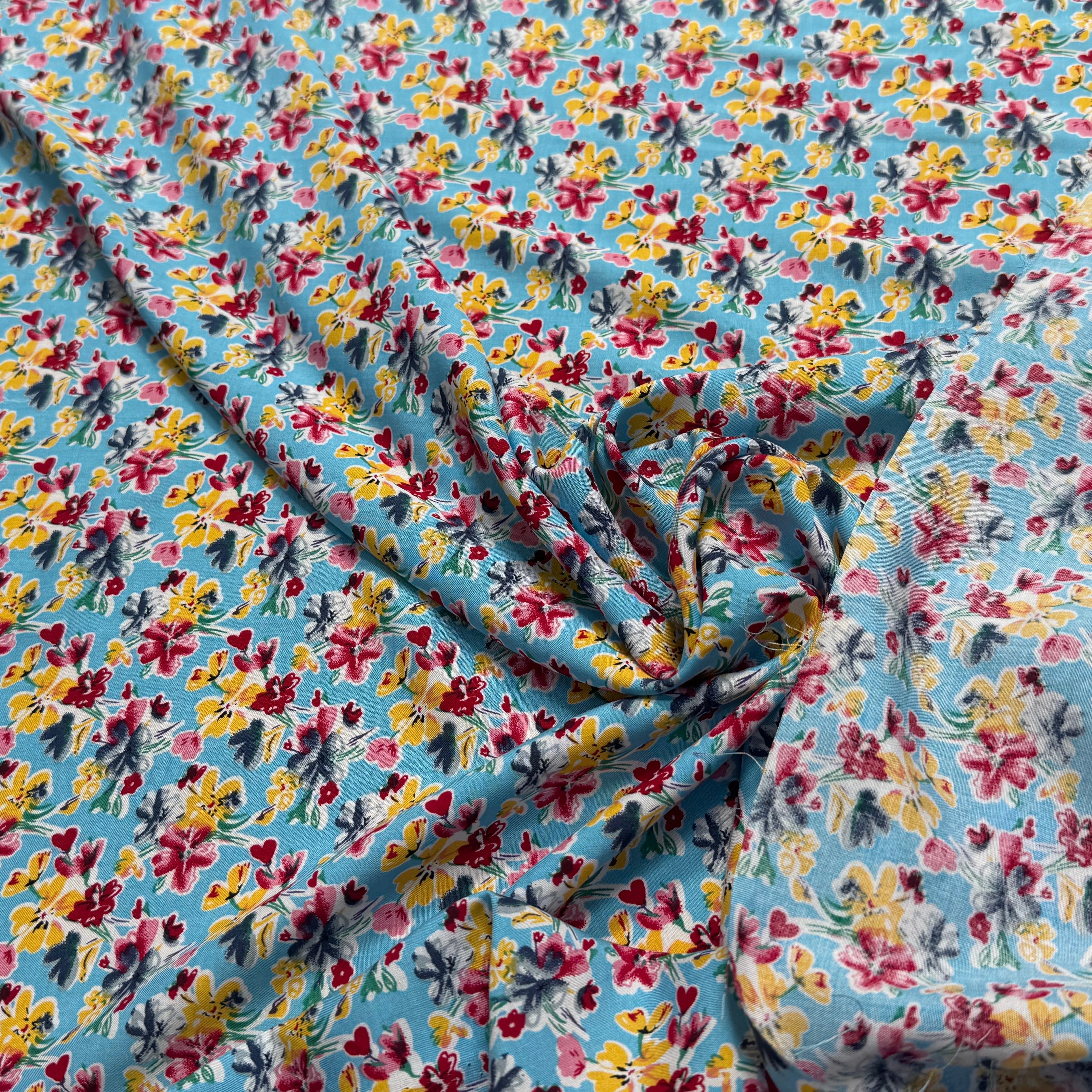 TISSU 100% VISCOSE FOND BLEU CIEL IMPRIMÉ BOUQUETS - My Little Coupon