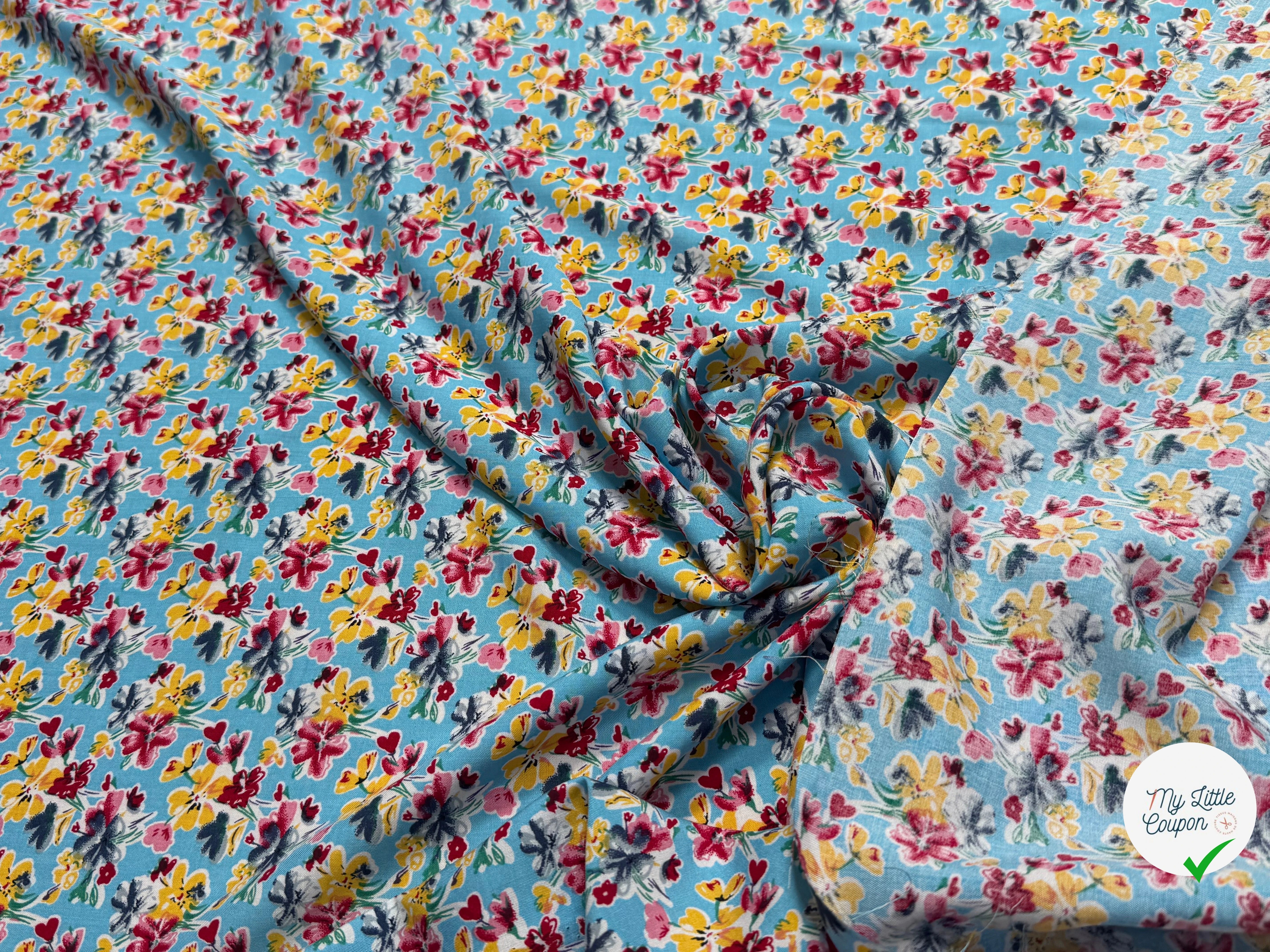 TISSU 100% VISCOSE FOND BLEU CIEL IMPRIMÉ BOUQUETS - My Little Coupon