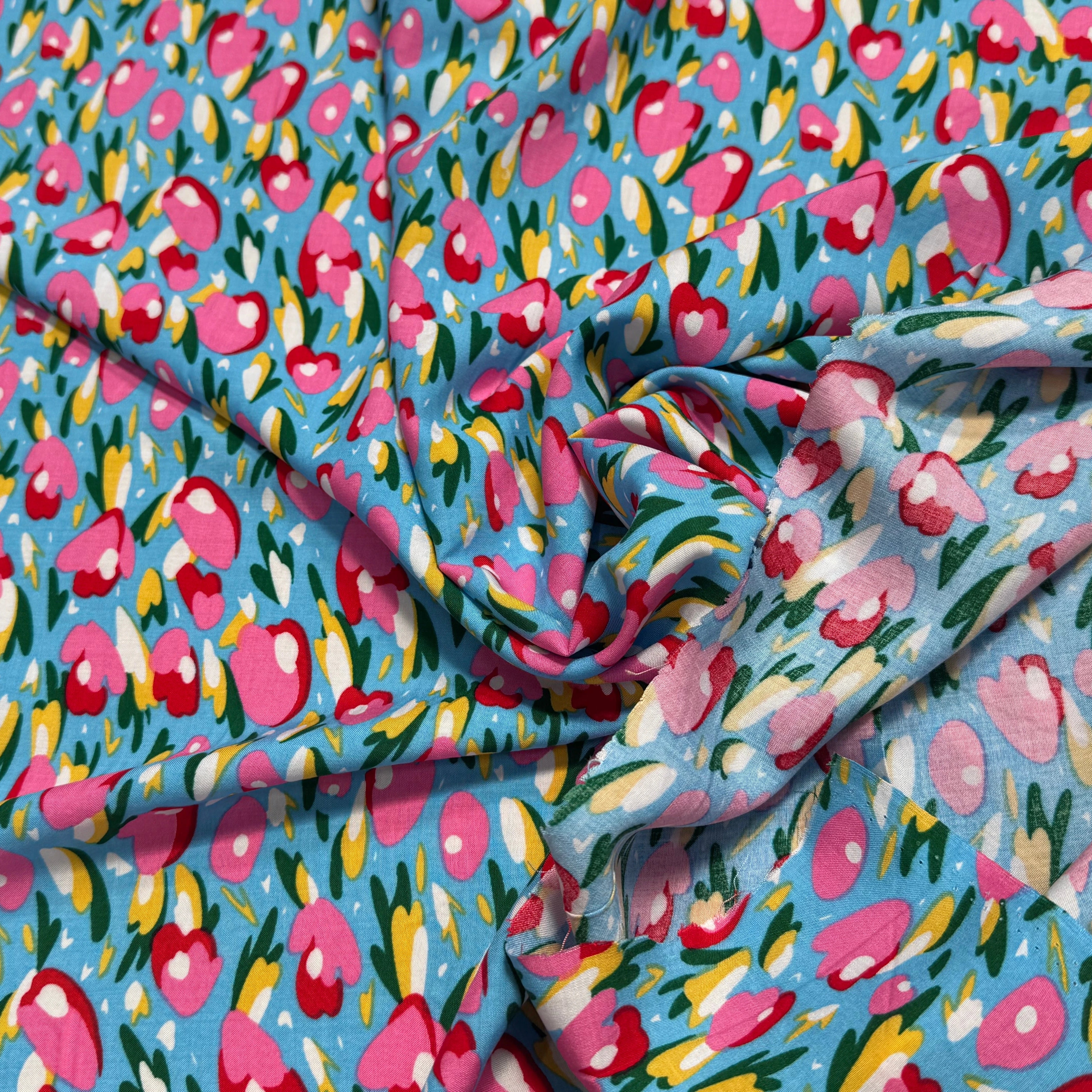 TISSU 100% VISCOSE FOND BONNIE BLUE IMPRIMÉ TULIP - My Little Coupon
