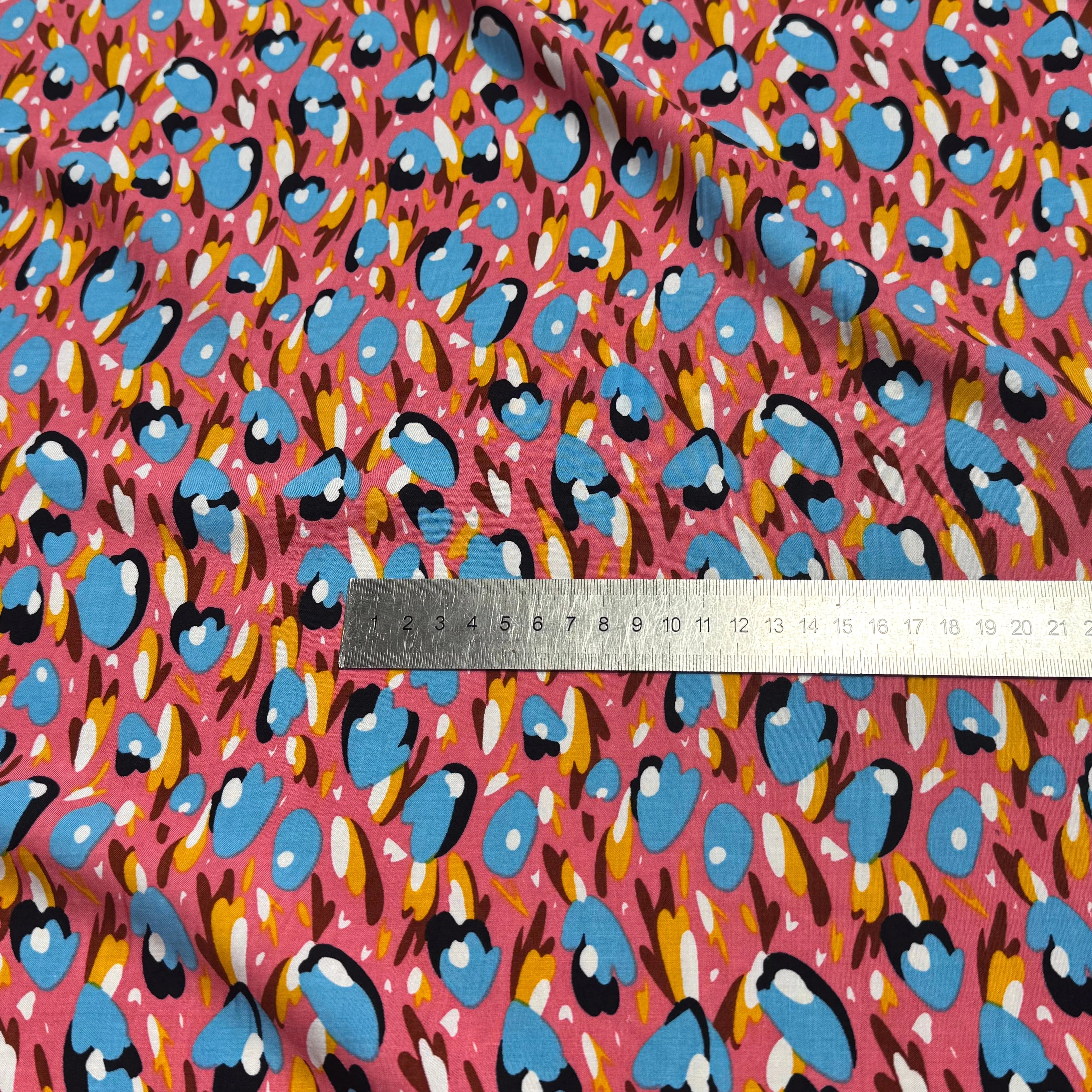 TISSU 100% VISCOSE FOND ROSE/PÊCHE IMPRIMÉ TULIP - My Little Coupon