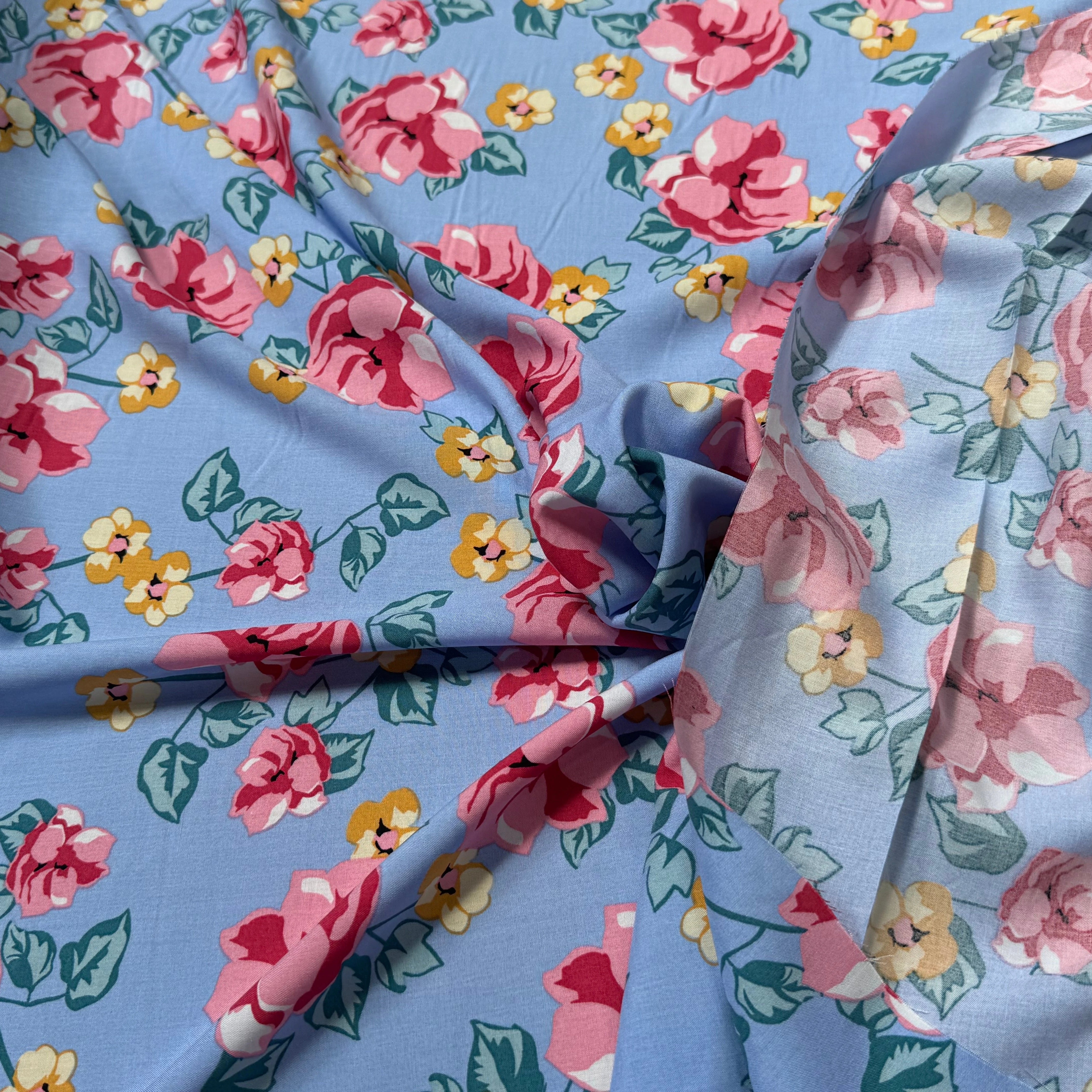 TISSU 100% VISCOSE IMPRIMÉ BRANCHES À FLEURS FOND BLEU CIEL - My Little Coupon