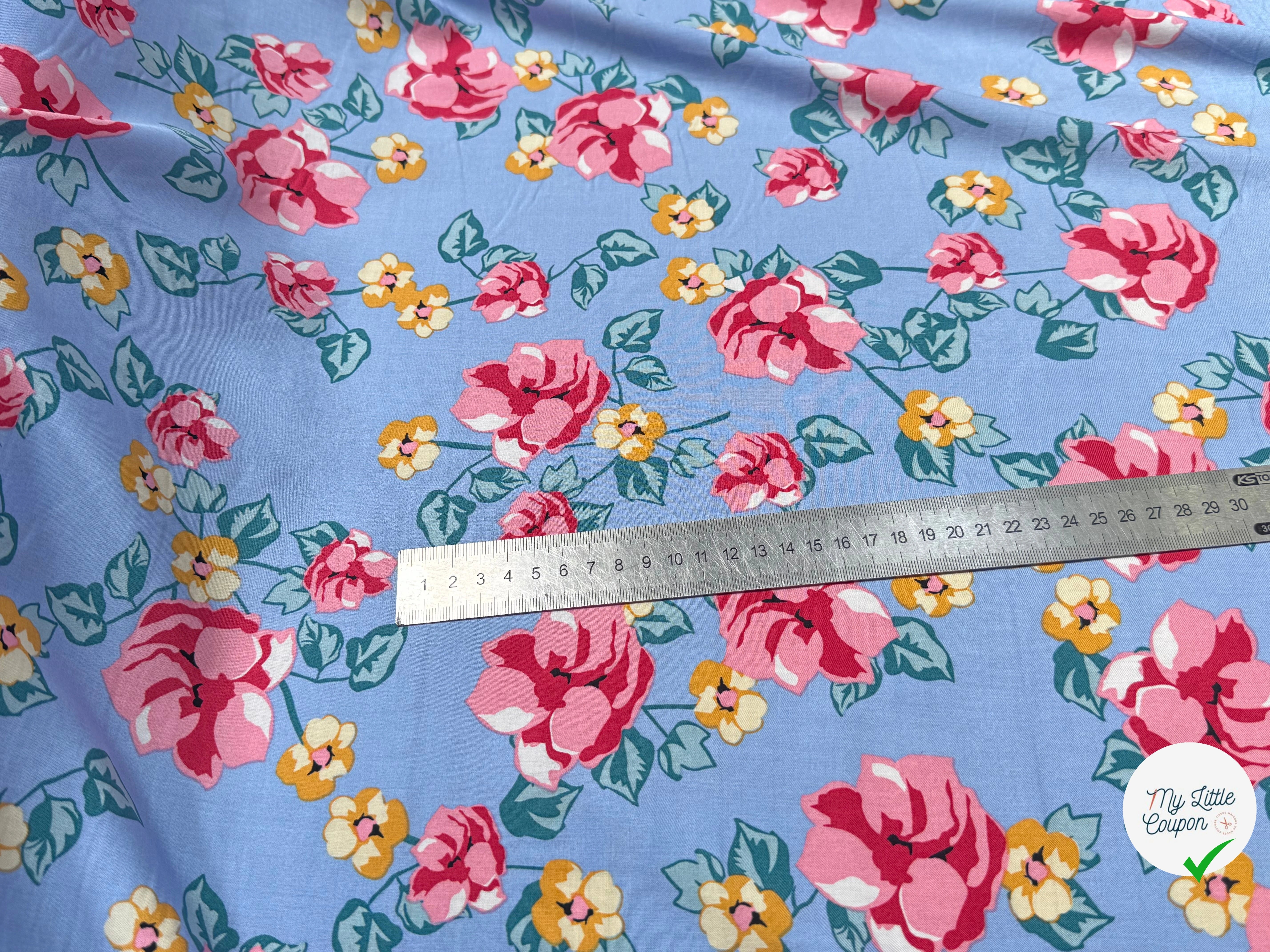 TISSU 100% VISCOSE IMPRIMÉ BRANCHES À FLEURS FOND BLEU CIEL - My Little Coupon