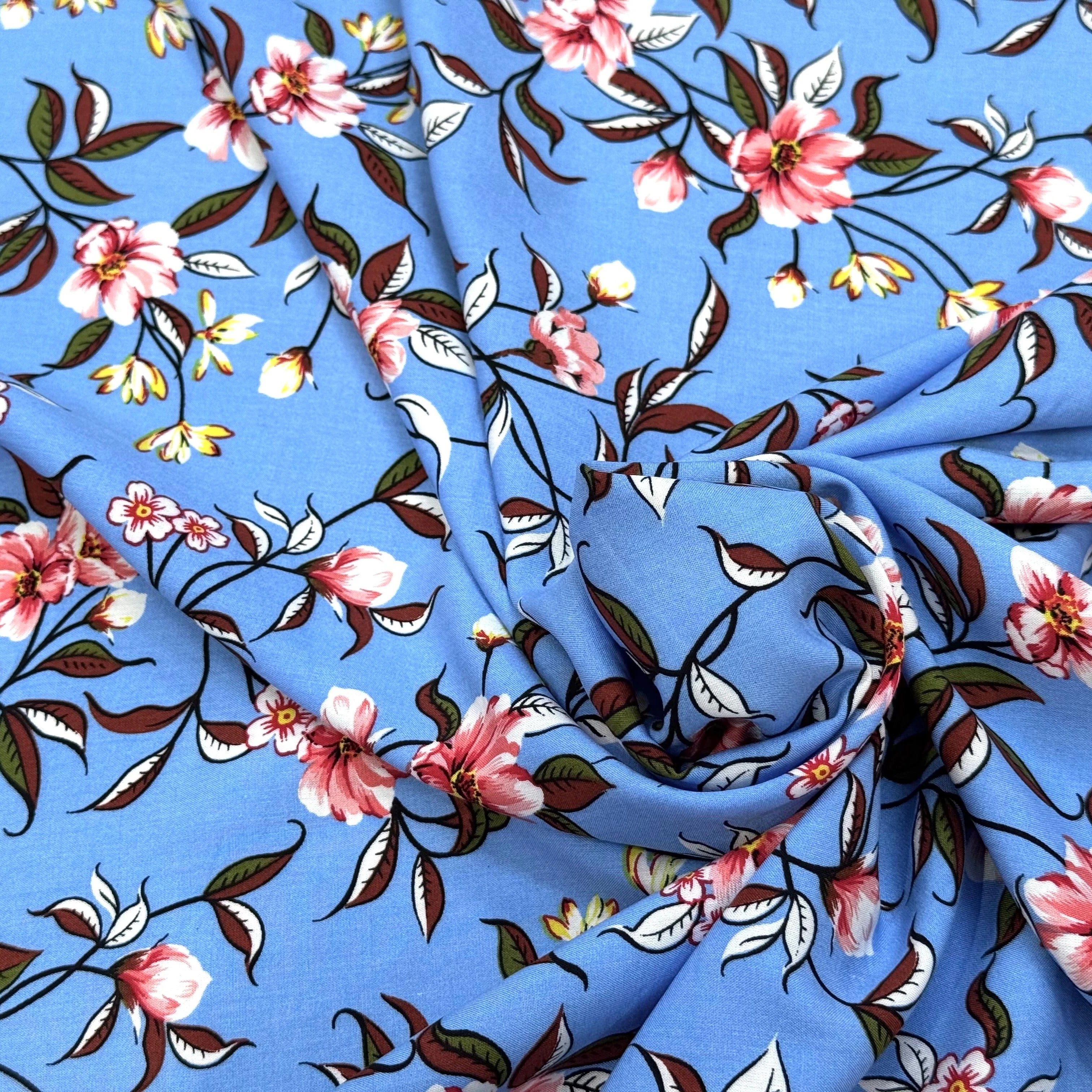 TISSU 100% VISCOSE IMPRIMÉ FOND BLEU CIEL - My Little Coupon