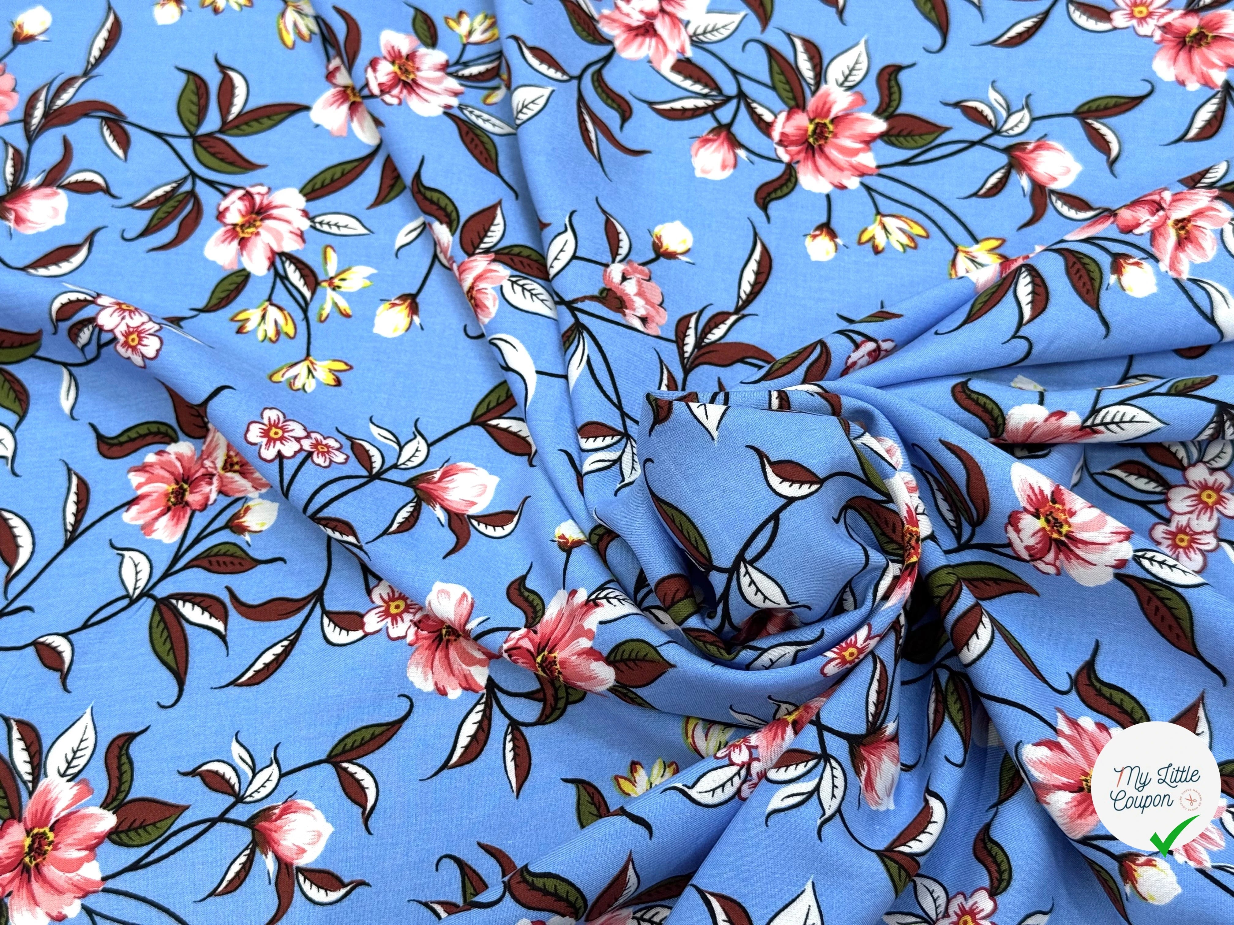 TISSU 100% VISCOSE IMPRIMÉ FOND BLEU CIEL - My Little Coupon