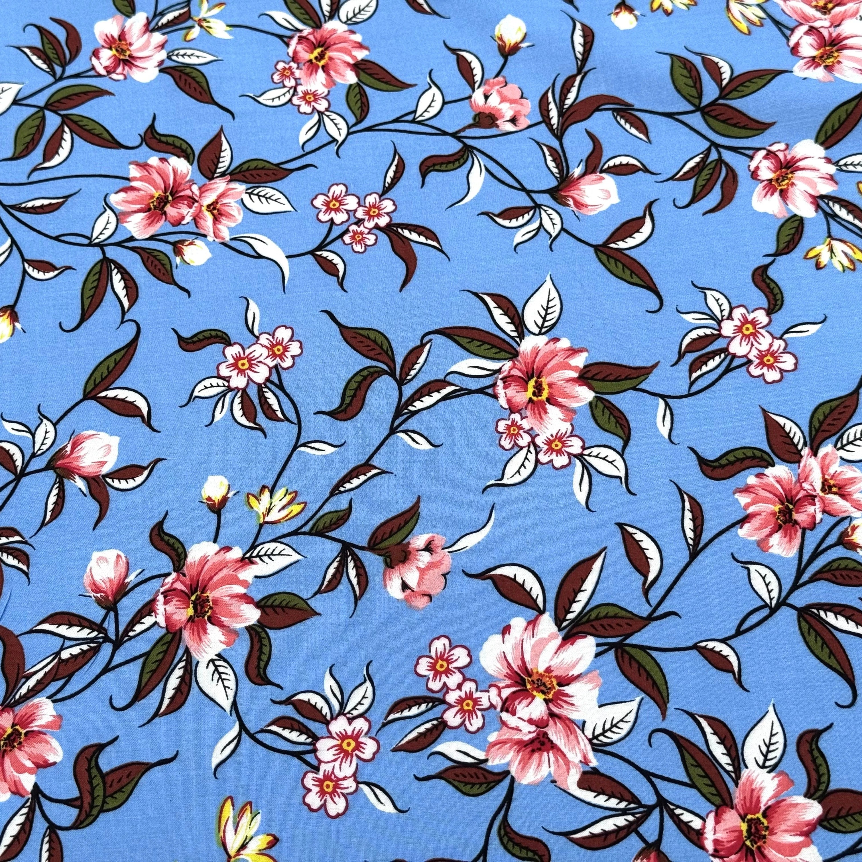 TISSU 100% VISCOSE IMPRIMÉ FOND BLEU CIEL - My Little Coupon