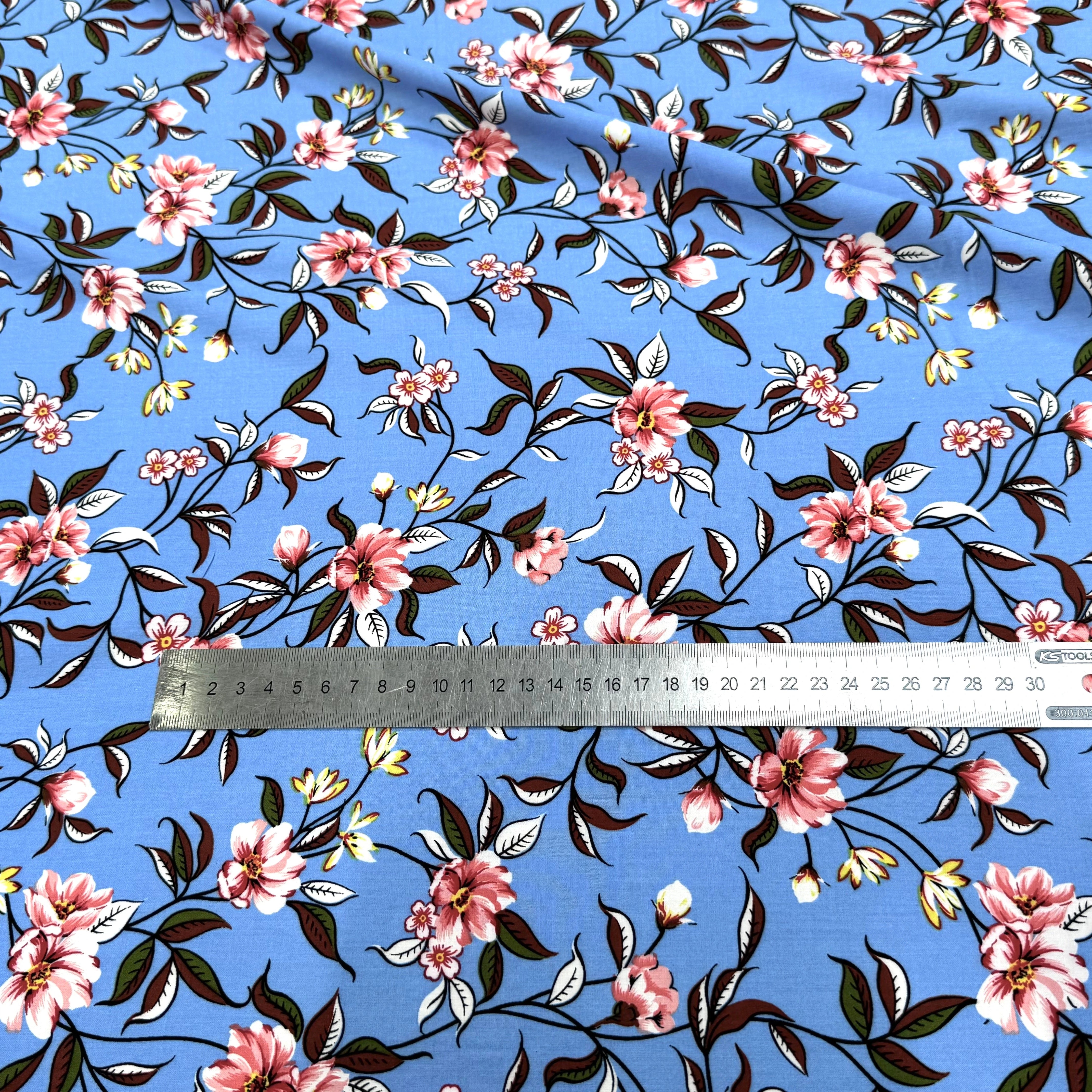 TISSU 100% VISCOSE IMPRIMÉ FOND BLEU CIEL - My Little Coupon