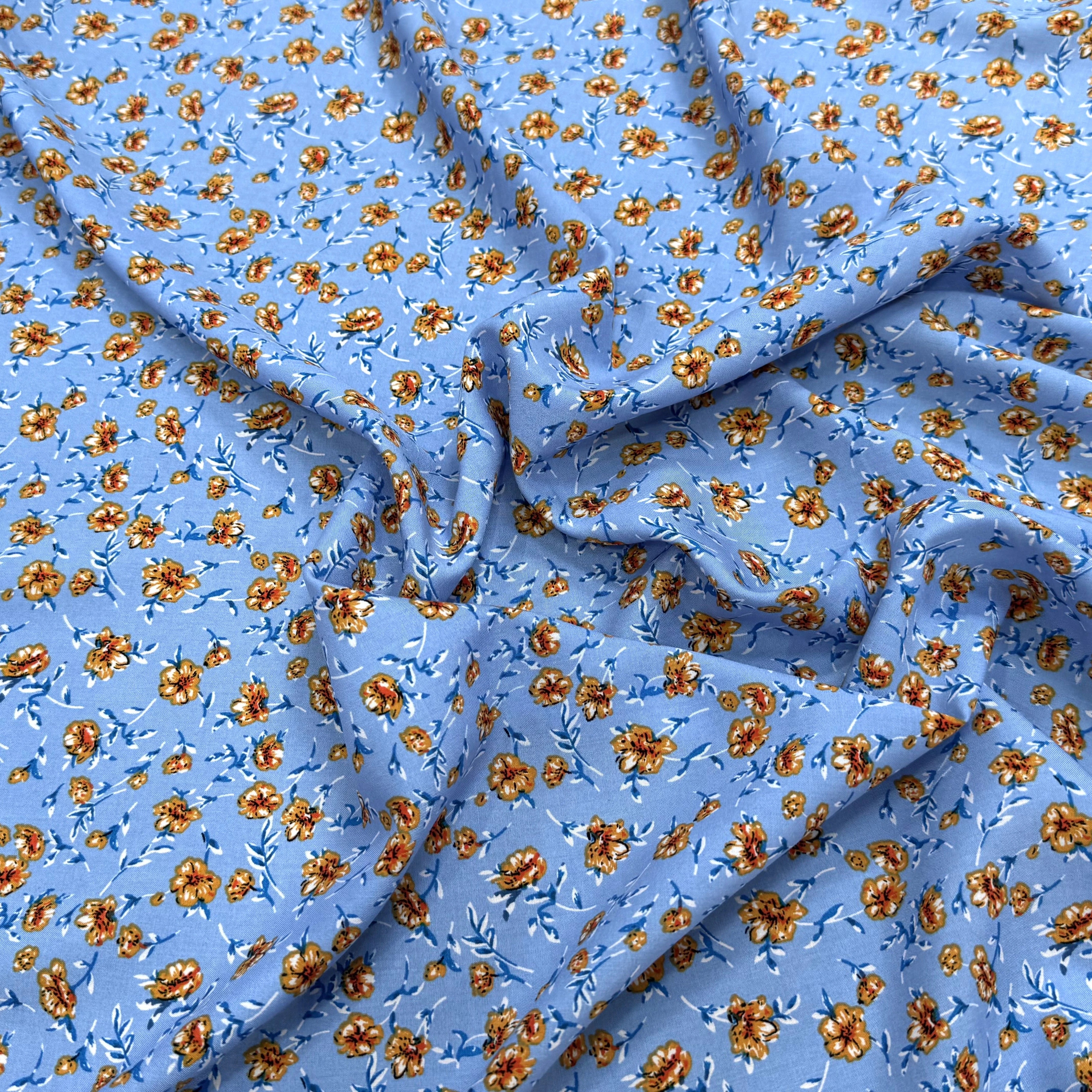 TISSU 100% VISCOSE IMPRIMÉ MINI FLEURS FOND BLEU CIEL - My Little Coupon