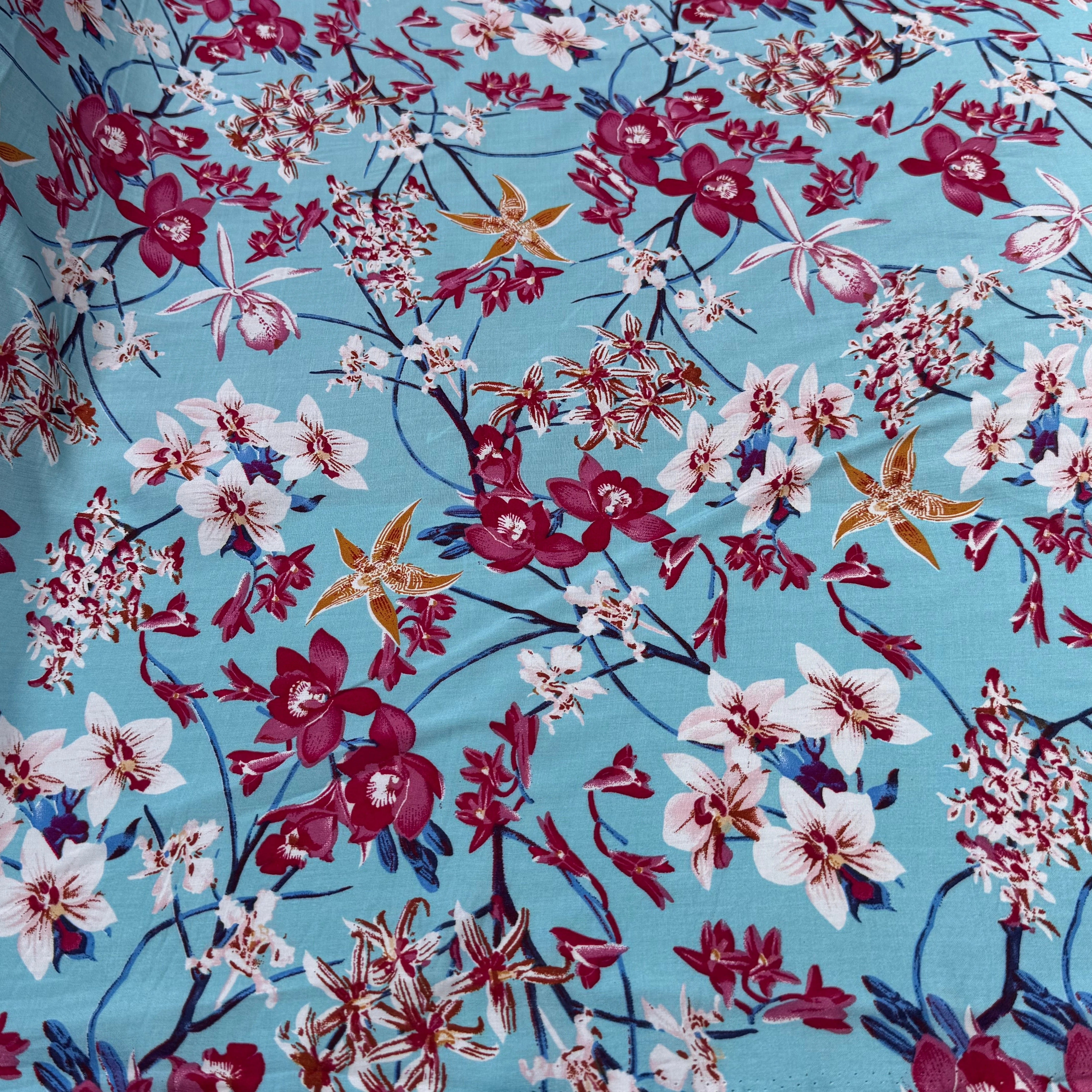 TISSU 100% VISCOSE IMPRIMÉ MOTIFS FLOREAUX FOND TURQUOISE - My Little Coupon