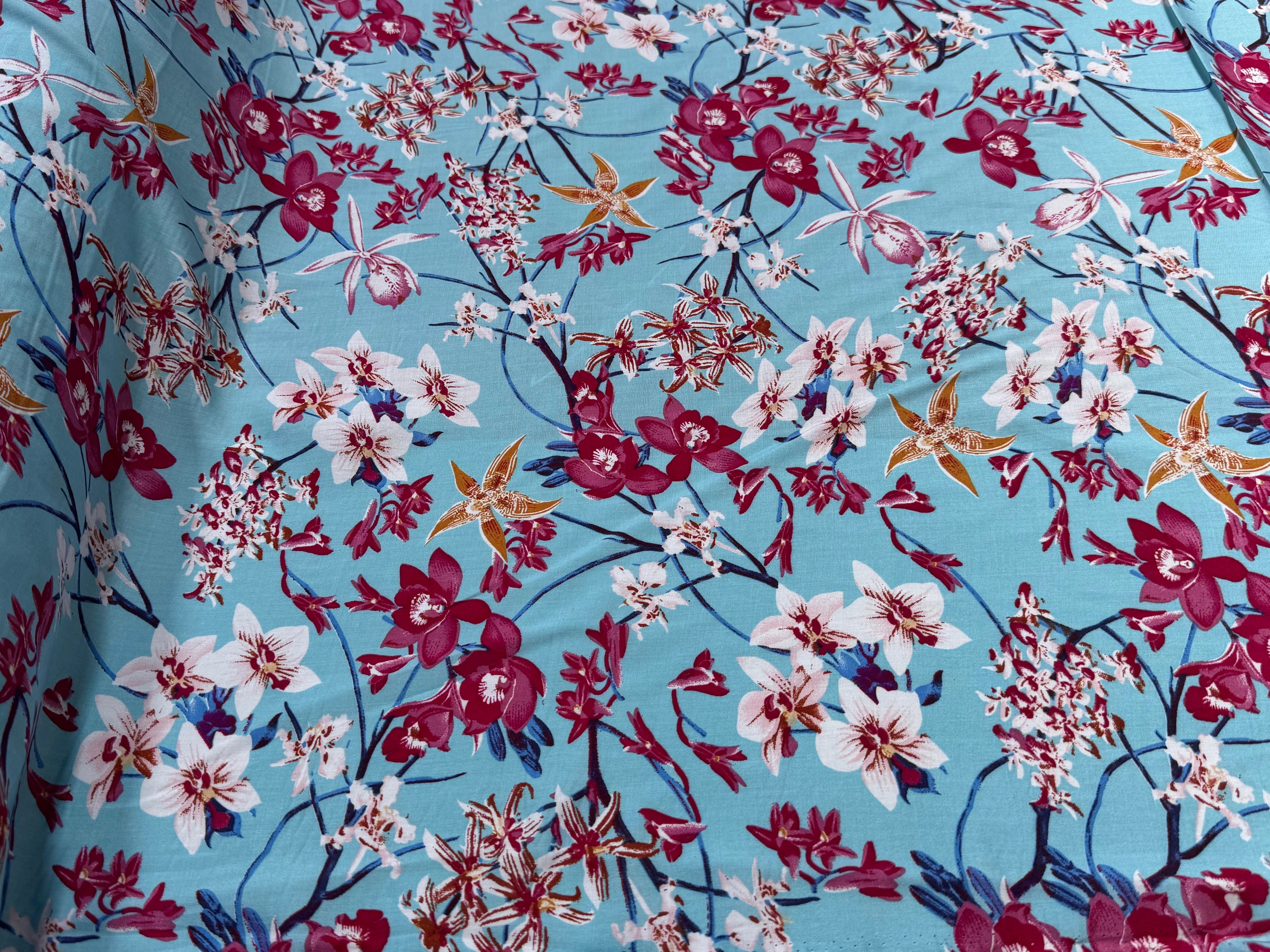 TISSU 100% VISCOSE IMPRIMÉ MOTIFS FLOREAUX FOND TURQUOISE - My Little Coupon
