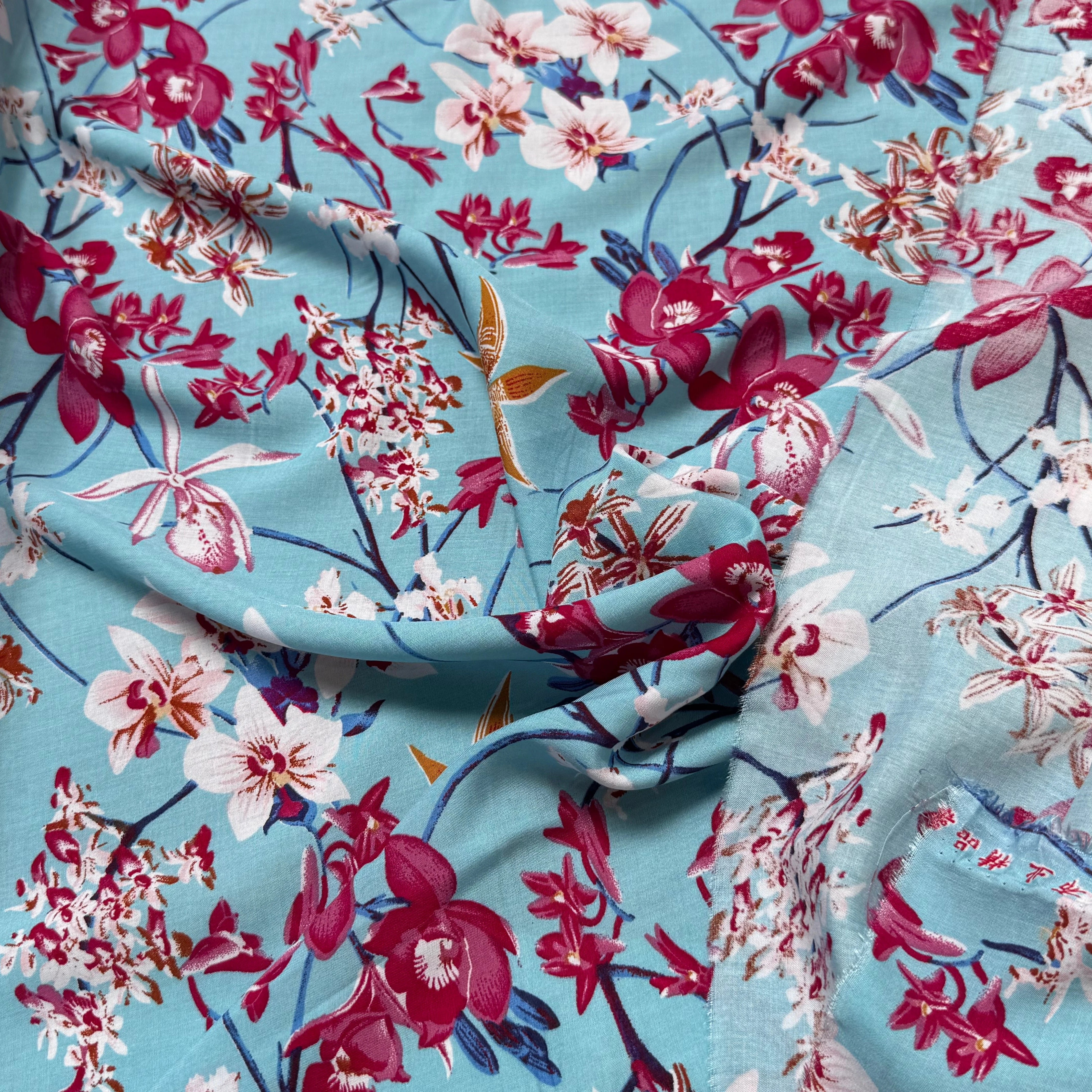 TISSU 100% VISCOSE IMPRIMÉ MOTIFS FLOREAUX FOND TURQUOISE - My Little Coupon