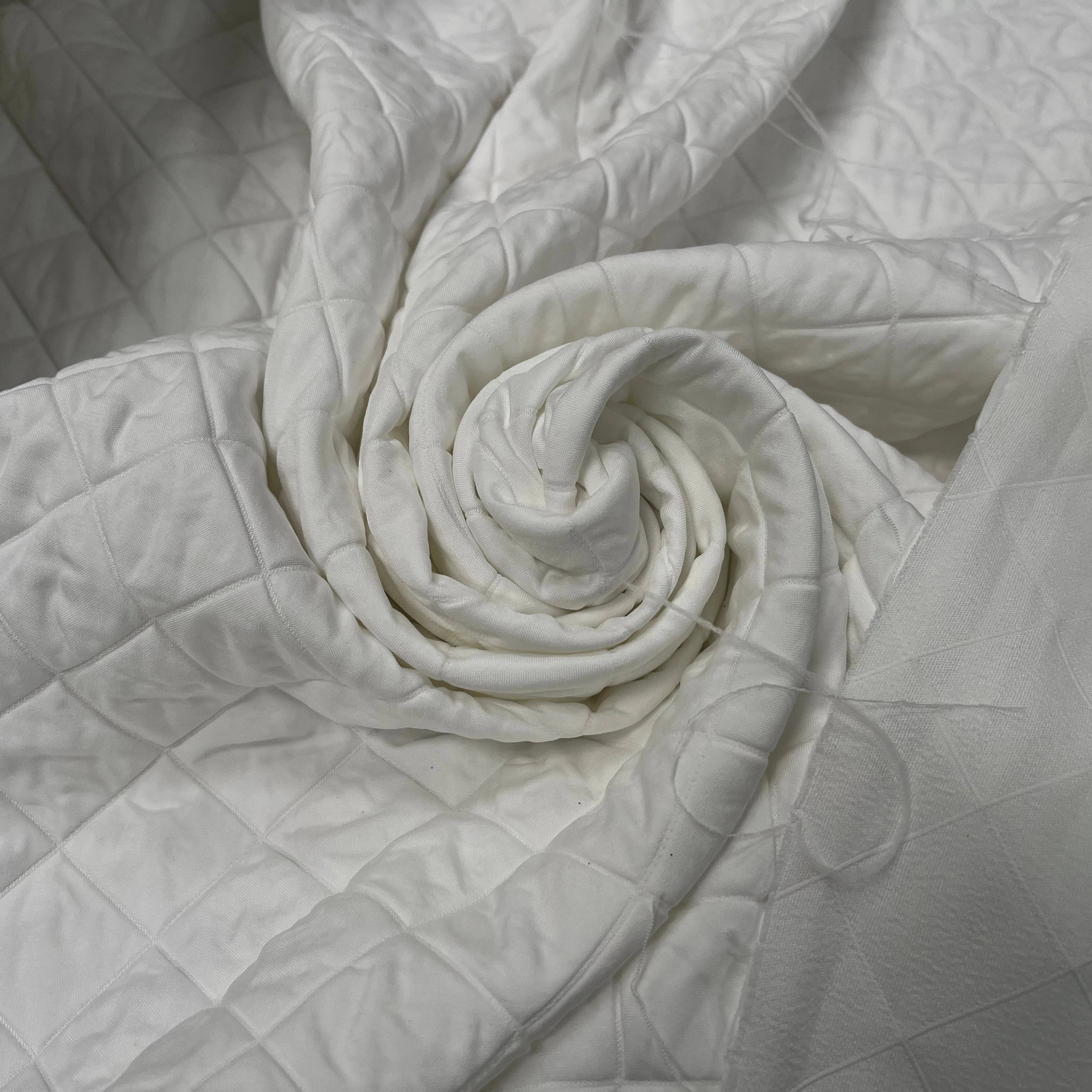 TISSU MATELASSÉ BLANC MOTIF LOSANGE ENVERS DOUX - My Little Coupon