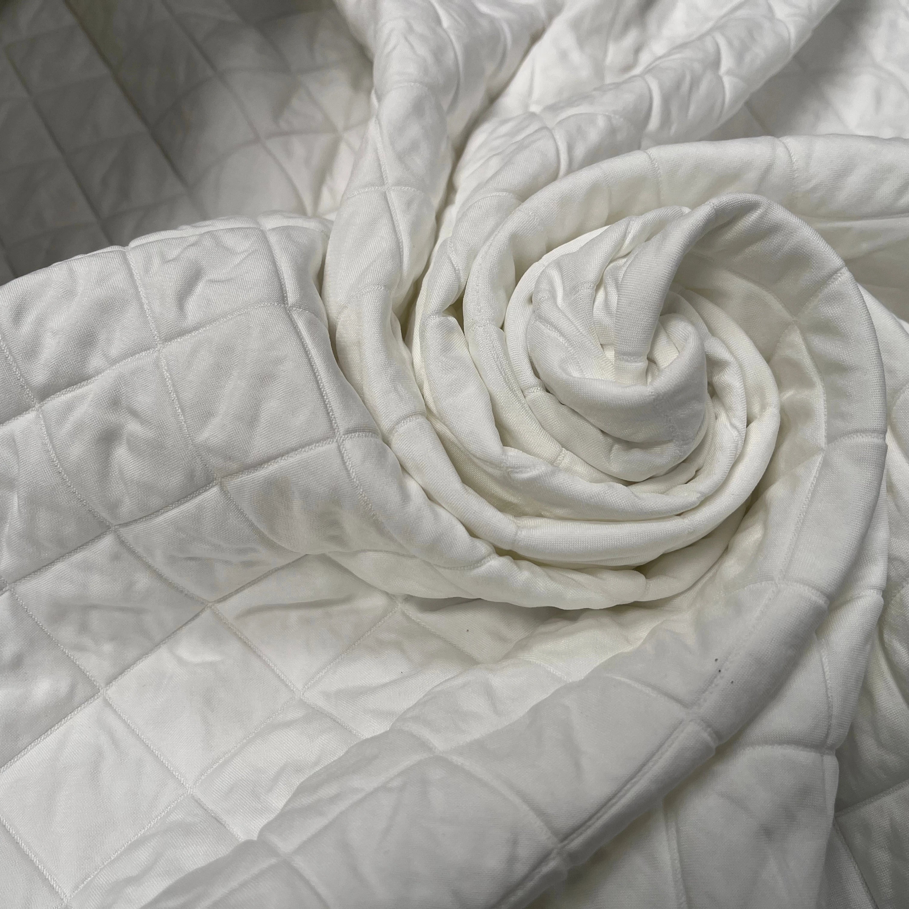 TISSU MATELASSÉ BLANC MOTIF LOSANGE ENVERS DOUX - My Little Coupon