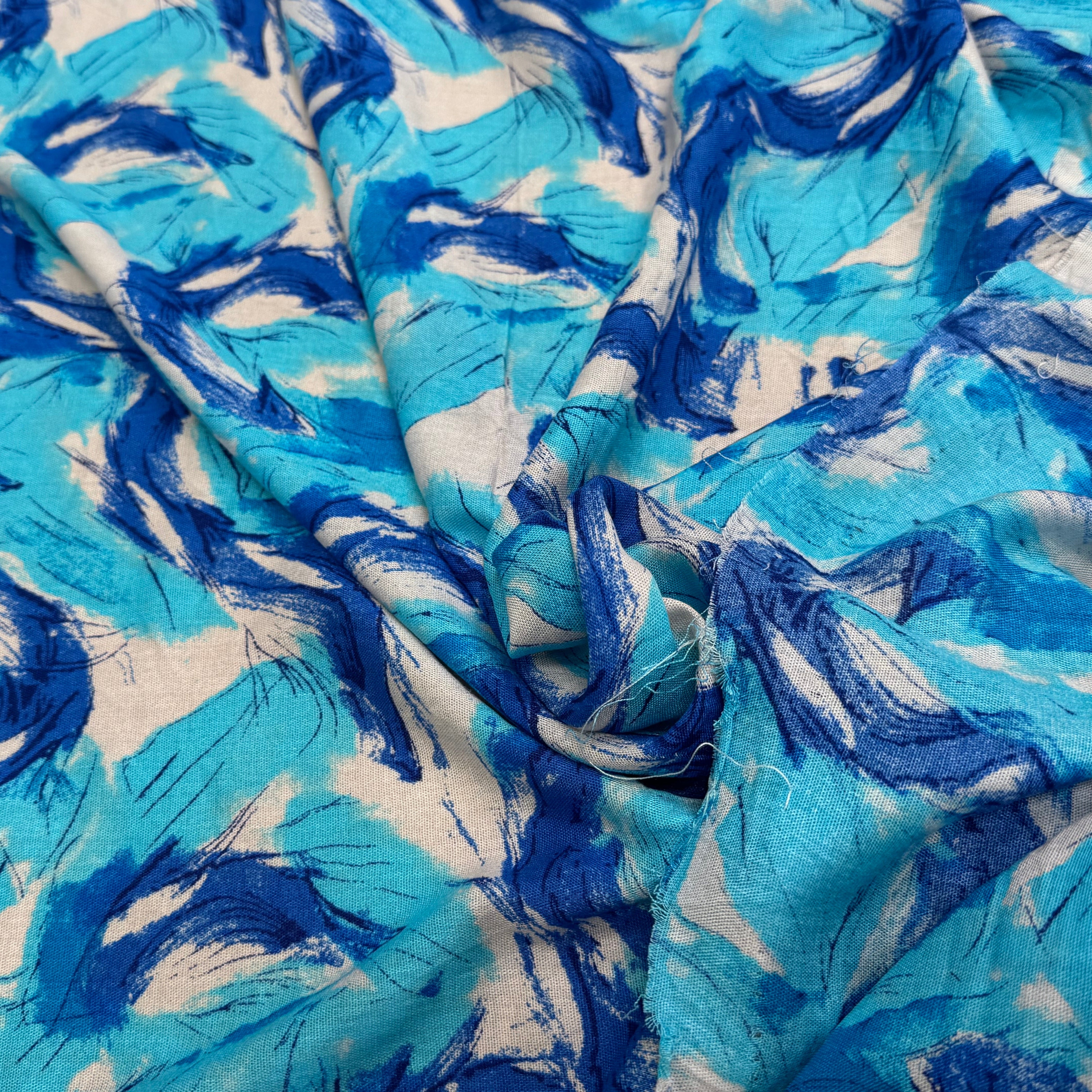 VISCOSE FLUIDE FOND BLANC IMPRIMÉE TOURBILLON ROI TURQUOISE - My Little Coupon