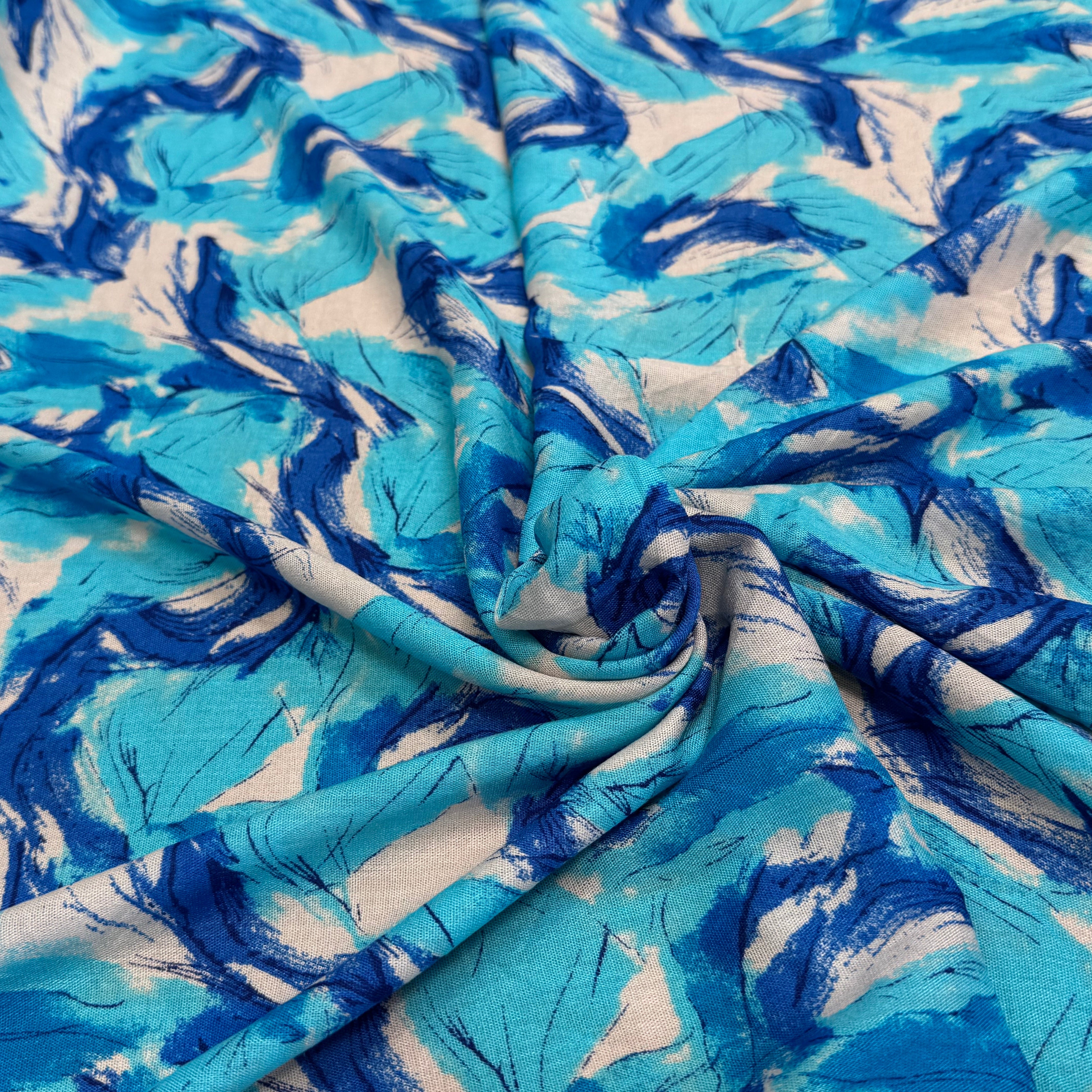 VISCOSE FLUIDE FOND BLANC IMPRIMÉE TOURBILLON ROI TURQUOISE - My Little Coupon