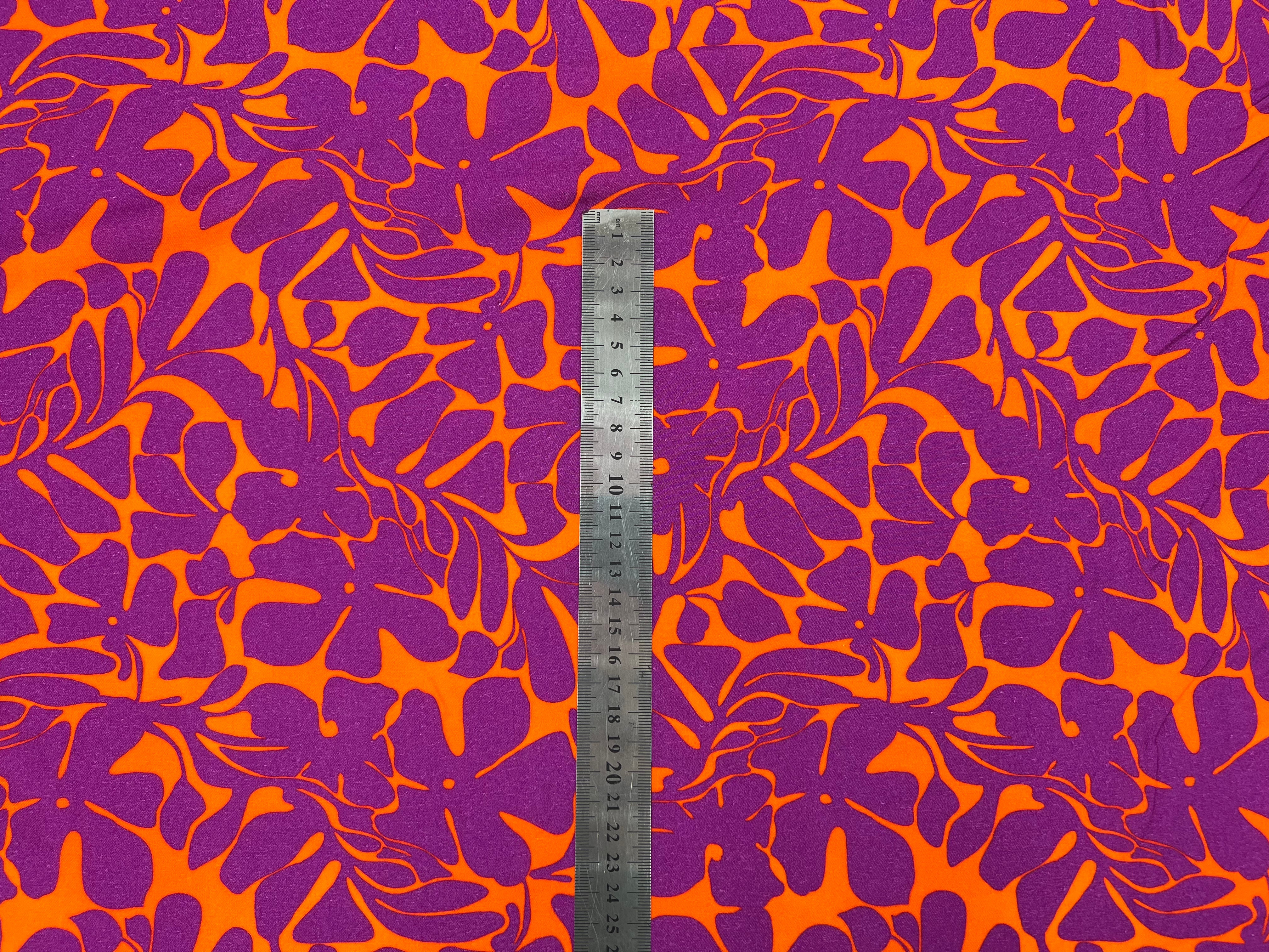 VISCOSE IMPRIMÉE FLEURS VIOLETTES SUR LIT D'ORANGE MSO