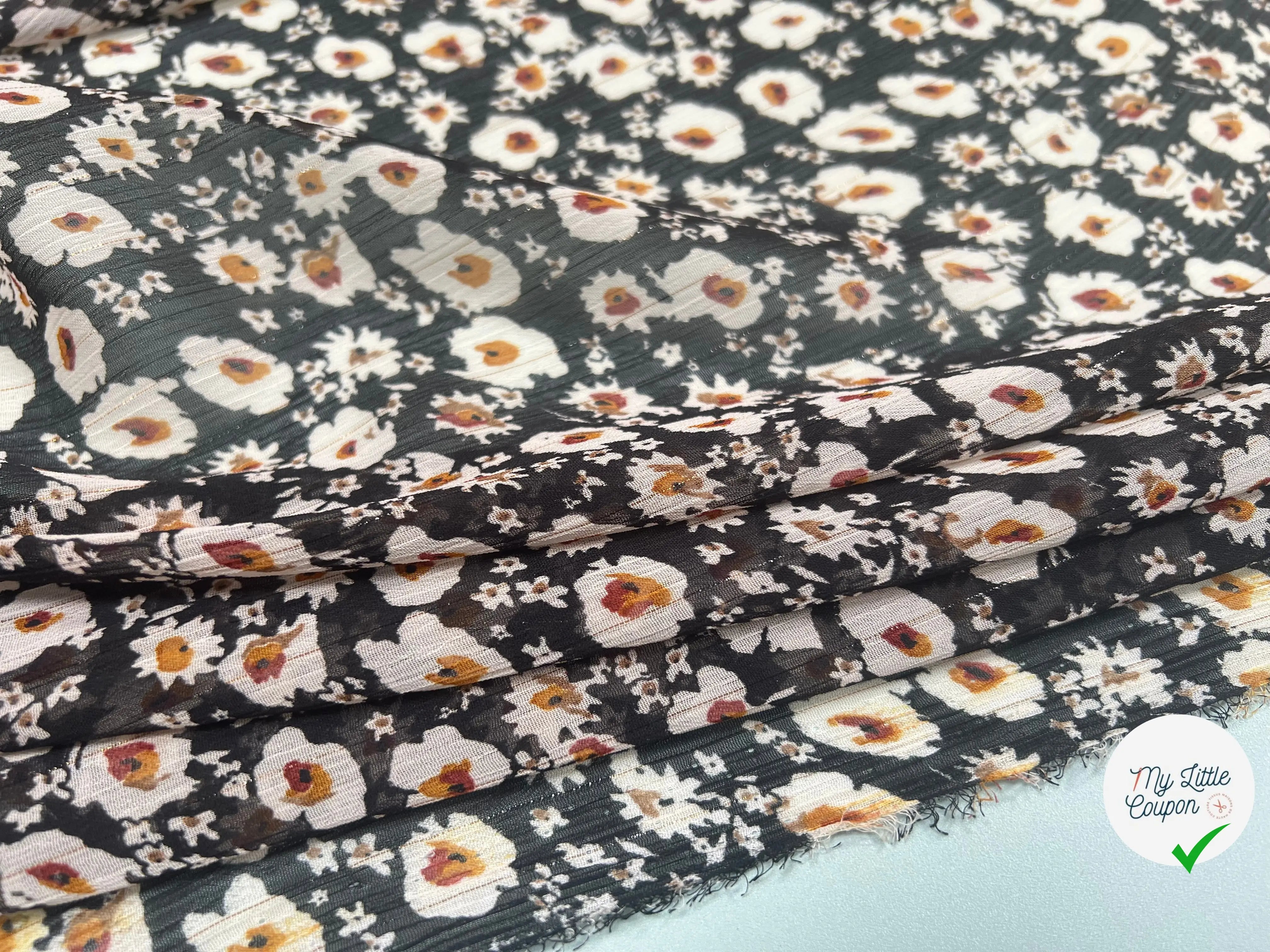 VOILE LUREX TESSUTO 100%PL FOND NOIR PETITES FLEURS BLANC - My Little Coupon