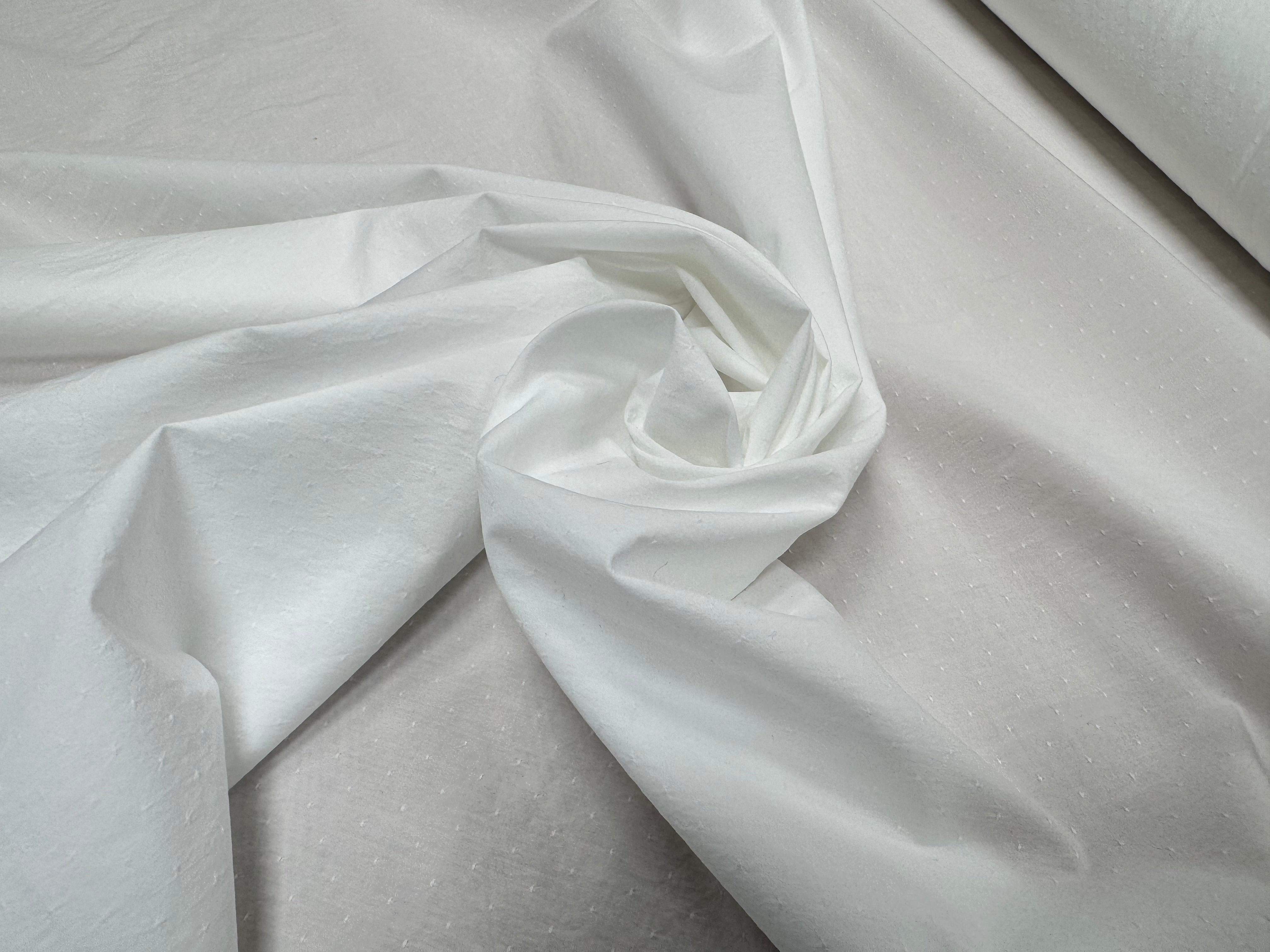 POPELINE DE COTON MICROSTONE CRAQUANT PLUMETIS BLANC - My Little Coupon