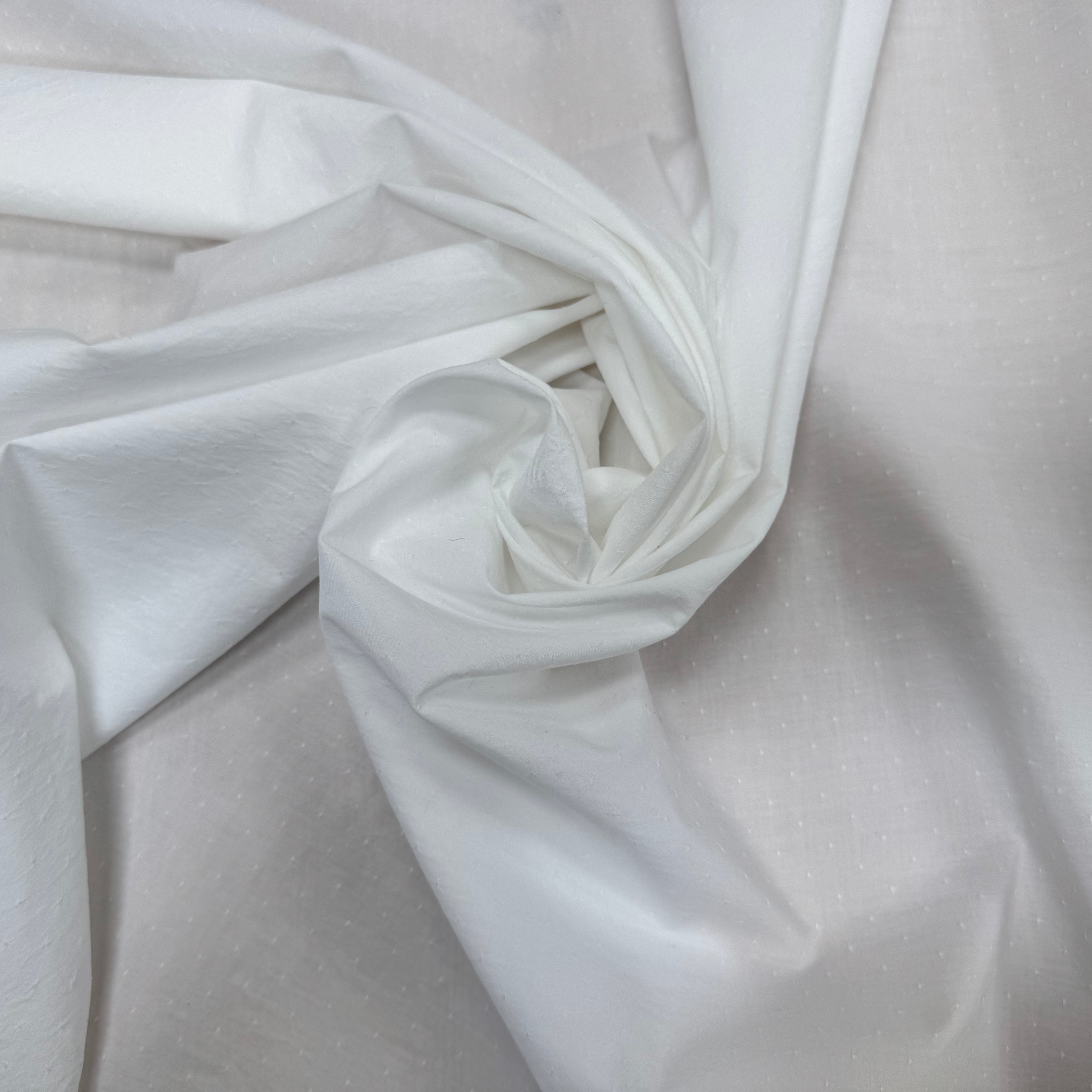 POPELINE DE COTON MICROSTONE CRAQUANT PLUMETIS BLANC - My Little Coupon