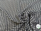 CRÊPE DE VISCOSE IMPRIMÉ SEMIS DE FLEURS FOND NOIR - My Little Coupon